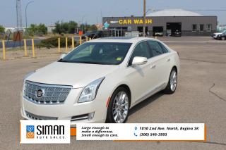 <p><strong>LOW LOW LOW KM SASKATCHEWAN VEHICLE</strong></p>

<p>Our 2013 Cadillac XTS Platinum has been through a <strong>presale inspection fresh full synthetic oil service . new air filters,  New rear shocks, New Tires all around Carfax reports Saskatchewan Vehicle with no serious collisions. Financing Available on site Trades encouraged. Aftermarket warranties to fit every need and budget.</strong> The 2013 Cadillac XTS replaces both the DTS and STS luxury cruisers. A spacious, high-tech cabin and all-wheel drive make the XTS a strong contender in the full-size luxury segment.Outside, the XTS expresses Cadillac's current styling vocabulary with its prominent grille, vertical headlamps and taillights, and sharply creased surfaces. The cabin speaks of modern refinement with its use of aluminum, leather and wood, and it's also highlighted by CUE, Cadillac's new electronics interface. It features a touch-sensitive display on the center stack to control navigation, climate systems and connected communication apps like Pandora. antilock disc brakes, stability control and traction control, front- and rear-seat side airbags, side curtain airbags and front knee airbags. Also standard is OnStar, which includes automatic crash notification, on-demand roadside assistance, remote door unlocking, stolen vehicle assistance and turn-by-turn navigation. features include blind spot monitoring, lane departure warning, forward collision alert, rear cross-traffic alert and a vibrating driver seat that alerts the driver to an impending collision on either side of the vehicle. adaptive suspension dampers, xenon headlamps, heated mirrors, rear parking sensors, keyless ignition/entry, dual-zone automatic climate control, 10-way power front seats (with power lumbar control), a power tilt-and-telescoping steering wheel, and leather/faux-suede upholstery. Standard electronic features include Bluetooth phone and audio connectivity, an 8-inch center touchscreen, OnStar and an eight-speaker Bose sound system with a CD player, satellite radio, HD radio, iPod/USB connectivity and an auxiliary input. Luxury Collection adds a heated steering wheel, driver memory functions, heated and ventilated front seats, heated rear seats, interior ambient lighting, front and rear parking sensors, a rearview camera and rain-sensing wipers. Premium Collection package builds on those offerings with adaptive headlamps, a head-up display, tri-zone automatic climate control, a 110-volt power outlet, a navigation system, voice controls, a 14-speaker Bose surround-sound audio system and a suite of safety features that include blind spot detection, lane departure warning, rear cross-traffic alert and front collision alert. Finally, the Platinum Collection offers 20-inch wheels, unique exterior styling, a sunroof, a power rear sunshade and additional cabin leather trim. Driver Assist package, which includes adaptive cruise control with low-speed automatic braking.</p>

<p><span style=color:#2980b9><strong>Siman Auto Sales is large enough to make a difference but small enough to care. We are family owned and operated, and have been proudly serving Saskatchewan car buyers since 1998. We offer on site financing, consignment, automotive repair and over 90 preowned vehicles to choose from.</strong></span></p>