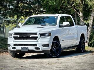 **Please note** An additional charge of $998 and $799 will be applied to this vehicle for Dealer-Installed Running Boards & LineX Bedliner.  Our New 2024 RAM 1500 Sport Crew Cab 4X4 is bold, athletic, and built to perform in Bright White! Motivated by a 5.7 Litre HEMI V8 serving up 395hp matched to an 8 Speed Automatic transmission for premium pulling power. This Four Wheel Drive truck is a fierce performer with heavy-duty shocks to handle big jobs, and it scores nearly 10.5L/100km on the highway. Designed to dominate, our RAM 1500 has a bold design with LED lighting, fog lamps, 20-inch alloy wheels, heated power-folding mirrors, a sunroof, class IV hitch receiver, and a damped tailgate.  Once inside, our Sport cabin helps lift your spirits with comfortable heated cloth front seats, 12-way power for the driver, a heated leather steering wheel, air conditioning, power-adjustable pedals, keyless access, pushbutton ignition, remote start, cruise control, and the digital benefits of Uconnect 5 technology. Highlights include a 12-inch touchscreen, full-colour navigation, Android Auto, Apple CarPlay, Bluetooth, voice recognition, and a six-speaker sound system. Theres clever storage to help you stay organized, too!  RAM supports your safety with a backup camera, forward collision warning, automatic braking, electronic stability control, traction control, hill-start assist, tire-pressure monitoring, trailer-sway damping, advanced multistage airbags, and more. Youre ready to rock when youre driving our RAM 1500 Sport! Save this Page and Call for Availability. We Know You Will Enjoy Your Test Drive Towards Ownership!