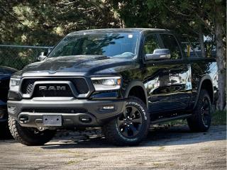 **Please note** An additional charge of $998 and $799 will be applied to this vehicle for Dealer-Installed Running Boards & LineX Bedliner.  Our New 2024 RAM 1500 Rebel Crew Cab 4X4 Night Edition with the Level 2 Equipment Pack is an aggressive adventure machine that defies the ordinary in Diamond Black Crystal Pearl, featuring the G/T Pack! Powered by a 5.7 Litre eTorque HEMI V8 supplying 395hp to an 8 Speed Automatic transmission for trail-friendly travels. This Four Wheel Drive truck also features versatile capability with a raised ride height, an electronic locking rear axle, robust skid plates, and a Class III bumper hitch, and it sees approximately 10.7L/100km on the highway. Our RAM shows its rebellious nature with LED lighting, fog lamps, a powder-coated front bumper, a sport performance hood, a sunroof, alloy wheels, off-road fender flares, a hitch receiver, and our Level 2 Pack for multifunction mirrors.  Rewarding features in our Rebel cabin come from our Level 2 Pack, which adds heated front seats, a heated premium steering wheel, power-adjustable pedals, a power rear window, 19-speaker Harman Kardon audio, remote start, and a 12-inch touchscreen. It complements standard features such as dual-zone automatic climate control, a 12.3-inch driver display, full-color navigation, WiFi compatibility, Android Auto®/Apple CarPlay®, Bluetooth®, and voice control.  RAM helps seal the deal with intelligent safety from forward collision warning, automatic braking, a rearview camera, hill start assistance, hill descent control, tire pressure monitoring, trailer sway damping, and more. With all that, our 1500 Rebel takes on tough challenges like a champ! Save this Page and Call for Availability. We Know You Will Enjoy Your Test Drive Towards Ownership!