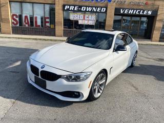 2014 BMW 428, A Great Driver with Amazing Performance !<br><br>GREAT CONDITION, this 2014 BMW 428 comes with a 2 LITRE 4 CYLINDER ENGINE that puts out 240 horsepower.<br><br>Interior includes: LEATHER HEATED SEATS, SUNROOF, a GREAT SOUNDING STEREO SYSTEM, and PADDLE SHIFTERS !<br><br>Well reviewed:  The new 2014 BMW 4 Series sleek exterior look promises a lot in the way of excitement, and it largely delivers on BMWs  Ultimate Driving Machine  tag line,  (edumunds.com).<br><br> The BMW 4 Series is an awesome car     a sporty rear-wheel-drive coupe or convertible heavily focused on performance. Its handling is nearly unmatched among luxury small cars , though some class rivals offer a more comfortable ride and/or more cabin space,  (cars.usnews.com).<br><br>Driving aids include: BACK UP CAMERA, NAVIGATION, and ALL WHEEL DRIVE X DRIVE.<br><br>Comes complete with power locks, power windows, and keyless remote entry.<br><br>This car has safety included in the advertised price.<br><br>Please Note: HST and Licensing is an additional fee separate from the advertised price. <br><br>We have a strong confidence in our cars, if you want to have a car inspected, Vision Fine Cars welcomes it.<br>  <br>Certain Crypto-Currency accepted as payment, Charges will apply.<br><br>