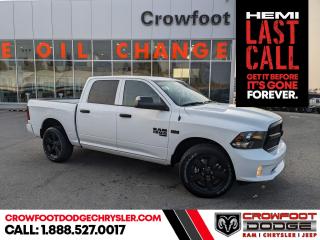 <b>Sub Zero Package, Night Edition, Wheel and Sound Group
!</b><br> <br> <br> <br>  This Ram 1500 Classic is a top contender in the full-size pickup segment thanks to a winning combination of a strong powertrain, a smooth ride and a well-trimmed cabin. <br> <br>The reasons why this Ram 1500 Classic stands above its well-respected competition are evident: uncompromising capability, proven commitment to safety and security, and state-of-the-art technology. From its muscular exterior to the well-trimmed interior, this 2023 Ram 1500 Classic is more than just a workhorse. Get the job done in comfort and style while getting a great value with this amazing full-size truck. <br> <br> This bright white Crew Cab 4X4 pickup   has an automatic transmission and is powered by a  395HP 5.7L 8 Cylinder Engine.<br> <br> Our 1500 Classics trim level is Express. This Ram 1500 Express features upgraded aluminum wheels, front fog lamps and USB connectivity, along with a great selection of standard features such as class II towing equipment including a hitch, wiring harness and trailer sway control, heavy-duty suspension, cargo box lighting, and a locking tailgate. Additional features include heated and power adjustable side mirrors, UCconnect 3, cruise control, air conditioning, vinyl floor lining, and a rearview camera. This vehicle has been upgraded with the following features: Sub Zero Package, Night Edition, Wheel And Sound Group
. <br><br> <br>To apply right now for financing use this link : <a href=https://www.crowfootdodgechrysler.com/tools/autoverify/finance.htm target=_blank>https://www.crowfootdodgechrysler.com/tools/autoverify/finance.htm</a><br><br> <br/> Total  cash rebate of $13352 is reflected in the price. Credit includes up to 20% MSRP. <br> Buy this vehicle now for the lowest bi-weekly payment of <b>$329.48</b> with $0 down for 96 months @ 6.49% APR O.A.C. ( Plus GST  documentation fee    / Total Obligation of $68532  ).  Incentives expire 2024-02-29.  See dealer for details. <br> <br>We pride ourselves in consistently exceeding our customers expectations. Please dont hesitate to give us a call.<br> Come by and check out our fleet of 80+ used cars and trucks and 180+ new cars and trucks for sale in Calgary.  o~o