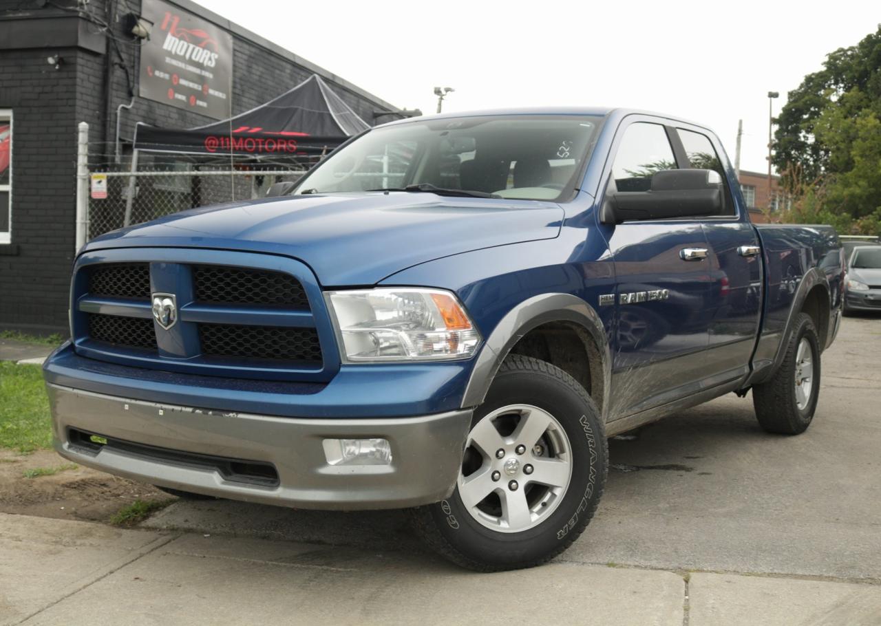 2011 RAM 1500 4WD Quad Cab 140.5" Outdoorsman - Photo #1