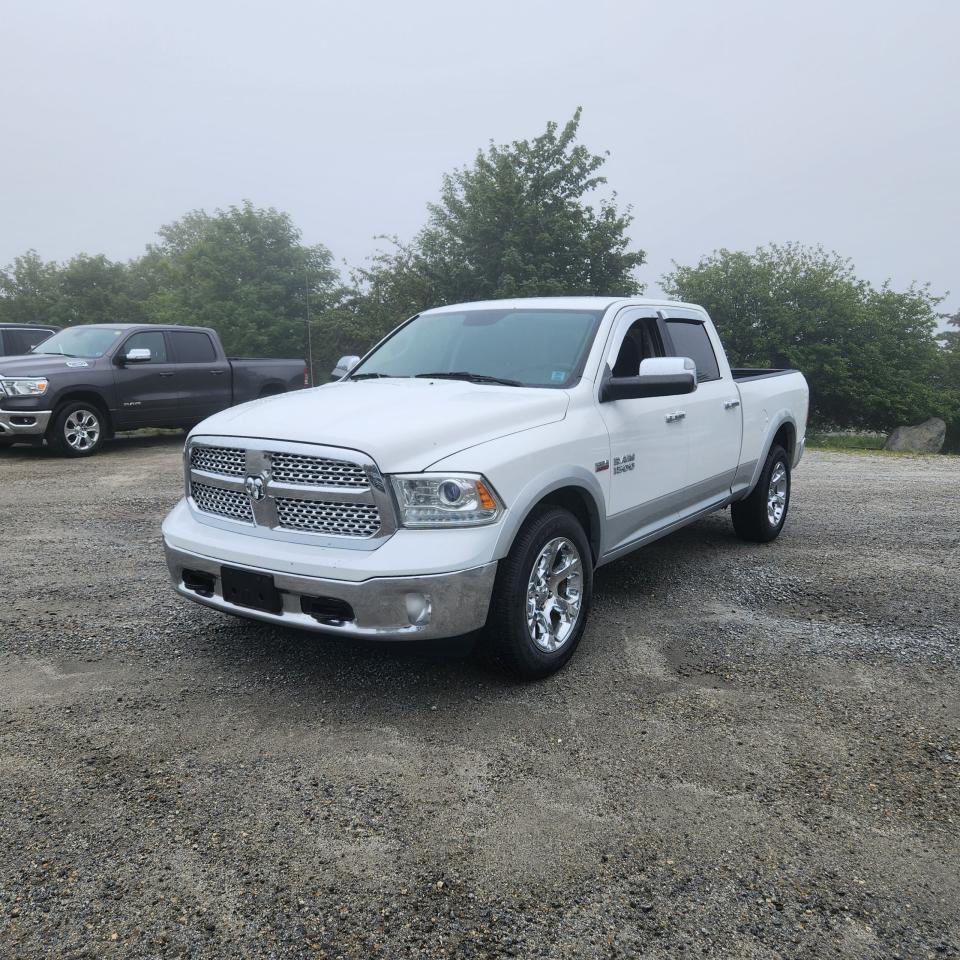 2017 RAM 1500 4WD Crew Cab 149" Laramie Photo1