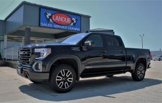 <p style=text-align: center; line-height: 1;><span style=font-family: arial, helvetica, sans-serif;><span style=font-size: 18pt;><strong>22 GMC SIERRA 1500 CREW CAB LTD </strong></span><span style=font-size: 24px;><strong>4WD.</strong></span></span></p><p style=text-align: center; line-height: 1;><em><span style=font-size: 18pt; font-family: arial, helvetica, sans-serif;><strong>*AT4 PREMIUM*</strong></span></em></p><p style=text-align: center; line-height: 1;><span style=font-family: arial, helvetica, sans-serif;><span style=font-size: 24px;><strong>POWERTRAIN & MECHANICAL</strong></span></span></p><p style=text-align: center; line-height: 1;><strong><span style=font-size: 14pt; font-family: arial, helvetica, sans-serif;>L87 EcoTec3 6.2L Di V8 ENGINE.</span></strong></p><p style=text-align: center; line-height: 1;><span style=font-size: 12pt;><span style=font-family: arial, helvetica, sans-serif;><em>Featuring;</em> Direct Injection, Variable Valve Timing,<em> & </em>Dynamic Fuel Management <em>(DFM)</em> - Enables the engine to operate in 17 different patterns between 2 & 8 Cylinders, depending on demand, to optimize Power Delivery & Fuel Efficiency.</span></span></p><p style=text-align: center; line-height: 1;><span style=font-size: 14pt; font-family: arial, helvetica, sans-serif;><strong>10-SPEED AUTOMATIC TRANSMISSION.</strong></span></p><p style=text-align: center; line-height: 1;><span style=font-size: 12pt;><span style=font-family: arial, helvetica, sans-serif;> - </span><span style=font-family: arial, helvetica, sans-serif;>ELECTRONICALLY CONTROLLED</span><span style=font-family: arial, helvetica, sans-serif;> w/ TOW/HAUL MODE.</span></span></p><p style=text-align: center; line-height: 1;><strong><span style=font-size: 14pt; font-family: arial, helvetica, sans-serif;>FOUR-WHEEL DRIVE (4WD) w/ AUTOTRAC<em>®</em> TWO-SPEED TRANSFER CASE.</span></strong></p><p style=text-align: center; line-height: 1;><strong><span style=font-family: arial, helvetica, sans-serif;><span style=font-size: 14pt;>AUTOMATIC LOCKING REAR DIFFERENTIAL w/ 3.23 </span><span style=font-size: 18.6667px;>REAR-AXLE </span><span style=font-size: 14pt;>RATIO.</span></span></strong></p><p style=text-align: center; line-height: 1;><strong><span style=font-size: 14pt; font-family: arial, helvetica, sans-serif;>20 MACHINED-ALUMINUM WHEELS w/ CARBON-GREY METALLIC ACCENTS.</span></strong></p><p style=text-align: center; line-height: 1;><strong><span style=font-size: 14pt; font-family: arial, helvetica, sans-serif;>275/60R20 BSW ALL-TERRAIN TIRES.</span></strong></p><p style=text-align: center; line-height: 1;><span style=font-family: arial, helvetica, sans-serif;><em><strong><span style=font-size: 18pt;>*OFF-ROAD SUSPENSION PACKAGE*</span></strong></em></span></p><p style=text-align: center; line-height: 1;><span style=font-family: arial, helvetica, sans-serif;><span style=font-size: 18.6667px;><em>Includes; </em>2 Lift & Monotube Shocks, Skid Plates, Hill Descent Control & High-Capacity Air Cleaner.</span></span></p><p style=text-align: center; line-height: 1;><span style=font-family: arial, helvetica, sans-serif;><strong><span style=font-size: 18pt;>*AT4 PREMIUM PACKAGE*</span></strong></span></p><p style=text-align: center; line-height: 1;><span style=font-family: arial, helvetica, sans-serif;><span style=font-size: 18.6667px;>Lane-Change Alert w/ Side Blind-Zone Alert, Rear Cross-Traffic Alert, Premium GMC Infotainment System w/ Navigation, Premium BOSE</span></span><span style=font-family: arial, helvetica, sans-serif; font-size: 18.6667px;>®</span><span style=font-size: 18.6667px; font-family: arial, helvetica, sans-serif;> Audio System - Complete w/ 7 High-Performance Speakers Including A Richbass Woofer, Power-Sliding Rear Window, Wireless Charging, Universal Home Remote, AT4 High-Clearance Step, P275/60R20 All-Terrain Tires.</span></p><p style=text-align: center; line-height: 1;><strong><span style=font-size: 18pt; font-family: arial, helvetica, sans-serif;>*TECHNOLOGY PACKAGE*</span></strong></p><p style=text-align: center; line-height: 1;><span style=font-family: arial, helvetica, sans-serif;><span style=font-size: 18.6667px;>Head-Up Display, HD Surround Vision, Rear-View Camera Mirror, Enhanced 8 Driver Information Centre.</span></span></p><p style=text-align: center; line-height: 1;><span style=font-family: arial, helvetica, sans-serif;><strong><span style=font-size: 18pt;>*POWER SLIDING-&-TILTING GLASS SUNROOF*</span></strong></span></p><p style=text-align: center; line-height: 1;><span style=font-family: arial, helvetica, sans-serif;><strong><span style=font-size: 18pt;>*DRIVER-ALERT PACKAGE II*</span></strong></span></p><p style=text-align: center; line-height: 1;><span style=font-family: arial, helvetica, sans-serif; font-size: 18.6667px;>Adaptive Cruise Control,</span><span style=font-family: arial, helvetica, sans-serif; font-size: 18.6667px;> </span><span style=font-family: arial, helvetica, sans-serif;><span style=font-size: 18.6667px;>Following Distance Indicator, Forward Collision Alert, Low-Speed Forward Automatic Braking, Front Pedestrian Braking, Lane-Keep Assist w/ Lane-Departure Warning, IntelliBeam® - Auto. High-Beam Control, Driver’s Safety Alert Seat.</span></span></p><p style=text-align: center; line-height: 1;><span style=font-family: arial, helvetica, sans-serif;><strong><span style=font-size: 18pt;>*TRAILERING PACKAGE*</span></strong></span></p><p style=text-align: center; line-height: 1;><span style=font-family: arial, helvetica, sans-serif;><span style=font-size: 18.6667px;>Includes; Hitch Guidance, Trailer Brake Controller, GMC <em>ProGrade™</em> Trailering System.</span></span></p><p style=text-align: center; line-height: 1;><em><span style=font-size: 14pt; font-family: arial, helvetica, sans-serif;><strong style=font-size: medium;><span style=font-size: 18pt;>AT4 PREFERRED EQUIPMENT GROUP - 4SB</span></strong></span></em></p><p style=text-align: center; line-height: 1;><span style=font-family: arial, helvetica, sans-serif; font-size: 14pt;><em><strong>(INCLUDES STANDARD EQUIPMENT)</strong></em></span></p><p style=text-align: center; line-height: 1;><span style=font-family: arial, helvetica, sans-serif;><em><strong><span style=font-size: 18pt;>SAFETY / SECURITY FEATURES</span></strong></em></span></p><p style=text-align: center; line-height: 1;><span style=font-family: arial, helvetica, sans-serif;><span style=font-size: 18.6667px;>Teen Driver Mode, StabiliTrak® - Electronic Stability Control System, Automatic Front Headlamp & Rear Tail Lamp Control.</span></span></p><p style=text-align: center; line-height: 1;><span style=font-family: arial, helvetica, sans-serif;><em><strong><span style=font-size: 18pt;>CONNECTIVITY FEATURES</span></strong></em></span></p><p style=text-align: center; line-height: 1;><span style=font-size: 14pt; font-family: arial, helvetica, sans-serif;>Premium GMC Infotainment w/ 8 Colour Touch Screen Includes; Multi-Touch Display, Bluetooth® Streaming Audio For Music & Phones Featuring; Apple CarPlay® & Android Auto</span><span style=background-color: #ffffff; color: #212529; font-family: arial, helvetica, sans-serif; font-size: 18.6667px;>™</span><span style=font-family: arial, helvetica, sans-serif; font-size: 14pt;> Capability For Compatible Phones & Advanced Voice Recognition, SiriusXM® Radio, Bluetooth® For Phone, OnStar® Services.</span></p><p style=text-align: center; line-height: 1;><span style=font-family: arial, helvetica, sans-serif;><em><strong><span style=font-size: 18pt;>EXTERIOR FEATURES</span></strong></em></span></p><p style=text-align: center; line-height: 1;><em><span style=font-family: arial, helvetica, sans-serif;><span style=font-size: 18.6667px;>GMC MultiPro</span></span><span style=background-color: #ffffff; color: #212529; font-family: arial, helvetica, sans-serif; font-size: 18.6667px;>™</span></em><span style=font-size: 18.6667px; font-family: arial, helvetica, sans-serif;><em> Tailgate</em> w/ Six Functional Load/Access Features, Dual Exhaust w/ Premium Tips, Spray-On Bed Liner, Red Front Recovery Hooks, High Intensity LED Headlamps w/ LED Turn Signals & LED Daytime Running Lamps, LED Signature Tail Lamps, 120V Bed-Mounted Power Outlet, Power-Folding Exterior Mirrors w/ Drivers Side Auto-Dimming & Side Perimeter Lighting, Rear Wheelhouse Liners, Front LED Fog Lamps, LED Cargo Area Lighting, Power Lock & Release Tailgate w/ Lift-Assist, Cargo Tie Downs (12 Fixed) Rated At 500 Lbs.</span></p><p style=text-align: center; line-height: 1;><span style=font-family: arial, helvetica, sans-serif;><em><span style=font-size: 18pt;><strong>INTERIOR FEATURES</strong></span></em></span></p><p style=text-align: center; line-height: 1;><span style=font-family: arial, helvetica, sans-serif;><span style=font-size: 18.6667px;>Heated & Ventilated Perforated Leather-Appointed Bucket Seats, 10-Way Power Front Seats w/ Power Lumbar, Memory Settings For Driver’s Seat & Outside Mirrors, Dual-Zone Automatic Climate Control, Driver & Front Passenger Express Up & Down Power Windows, Auto-Dimming Rear-View Mirror, Tilt & Telescoping Steering Column, Rear Seat Storage Package, 120V Power Outlet, Remote Vehicle Start, Keyless Open & Start, Rear Window Defogger, Charge-Only USB Ports (2) In 2nd Row.</span></span></p><p style=text-align: center; line-height: 1;><span style=font-family: arial, helvetica, sans-serif;><em><strong><span style=font-size: 18pt;>SPECIFICATIONS</span></strong></em></span></p><p style=text-align: center; line-height: 1;><span style=font-family: arial, helvetica, sans-serif; font-size: 18.6667px;>420 HORSEPOWER@ 5600 RPM.</span></p><p style=text-align: center; line-height: 1;><span style=font-family: arial, helvetica, sans-serif; font-size: 18.6667px;>460 LB.-FT. OF TORQUE @ 4100 RPM.</span></p><p style=text-align: center; line-height: 1;><span style=font-size: 18.6667px; font-family: arial, helvetica, sans-serif;>GVWR: 7,000 LBS.</span></p><p style=text-align: center; line-height: 1;><strong><span style=font-family: arial, helvetica, sans-serif;><span style=font-size: 18.6667px;>Here at Lanoue/Amfar Sales, Service & Leasing in Tilbury, we take pride in providing the public with a wide variety of High-Quality Pre-owned Vehicles. We recondition and certify our vehicles to a level of excellence that exceeds the Status Quo. We treat our Customers like family and provide the highest level of service from Start to Finish. If you’d like a smooth & stress-free car shopping experience, give one of our Sales Associates a call at 1-844-682-3325 to help you find your next NEW-TO-YOU vehicle!</span></span></strong></p><p style=text-align: center; line-height: 1;><strong><span style=font-family: arial, helvetica, sans-serif;><span style=font-size: 18.6667px;>Although we try to take great care in being accurate with the information in this listing, from time to time, errors occur. The vehicle is priced as it is physically equipped. Minor variances will not effect pricing. Please verify the vehicle is As Expected when you visit. Thank You!</span></span></strong></p>