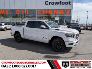 <b>Blind Spot Detection, Trailer Hitch!</b><br> <br> <br> <br>  Beauty meets brawn with this rugged Ram 1500. <br> <br>The Ram 1500s unmatched luxury transcends traditional pickups without compromising its capability. Loaded with best-in-class features, its easy to see why the Ram 1500 is so popular. With the most towing and hauling capability in a Ram 1500, as well as improved efficiency and exceptional capability, this truck has the grit to take on any task.<br> <br> This bright white Crew Cab 4X4 pickup   has an automatic transmission and is powered by a  395HP 5.7L 8 Cylinder Engine.<br> <br> Our 1500s trim level is Sport. This RAM 1500 Sport throws in some great comforts such as power-adjustable heated front seats with lumbar support, dual-zone climate control, power-adjustable pedals, deluxe sound insulation, and a heated leather-wrapped steering wheel. Connectivity is handled by an upgraded 12-inch display powered by Uconnect 5W with inbuilt navigation, mobile internet hotspot access, smart device integration, and a 10-speaker audio setup. Additional features include power folding exterior mirrors, a power rear window with defrosting, a trailer wiring harness, heavy-duty suspension, cargo box lighting, and a locking tailgate. This vehicle has been upgraded with the following features: Blind Spot Detection, Trailer Hitch. <br><br> <br>To apply right now for financing use this link : <a href=https://www.crowfootdodgechrysler.com/tools/autoverify/finance.htm target=_blank>https://www.crowfootdodgechrysler.com/tools/autoverify/finance.htm</a><br><br> <br/> Total  cash rebate of $7556 is reflected in the price. Credit includes up to 10% MSRP. <br> Buy this vehicle now for the lowest bi-weekly payment of <b>$404.35</b> with $0 down for 96 months @ 5.49% APR O.A.C. ( Plus GST  documentation fee    / Total Obligation of $84104  ).  Incentives expire 2024-02-29.  See dealer for details. <br> <br>We pride ourselves in consistently exceeding our customers expectations. Please dont hesitate to give us a call.<br> Come by and check out our fleet of 80+ used cars and trucks and 180+ new cars and trucks for sale in Calgary.  o~o