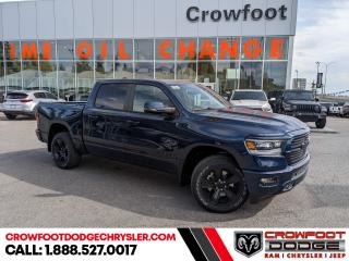 <b>Blind Spot Detection, Trailer Hitch!</b><br> <br> <br> <br>  Discover the inner beauty and rugged exterior of this stylish Ram 1500. <br> <br>The Ram 1500s unmatched luxury transcends traditional pickups without compromising its capability. Loaded with best-in-class features, its easy to see why the Ram 1500 is so popular. With the most towing and hauling capability in a Ram 1500, as well as improved efficiency and exceptional capability, this truck has the grit to take on any task.<br> <br> This patriot blu prl Crew Cab 4X4 pickup   has an automatic transmission and is powered by a  395HP 5.7L 8 Cylinder Engine.<br> <br> Our 1500s trim level is Sport. This RAM 1500 Sport throws in some great comforts such as power-adjustable heated front seats with lumbar support, dual-zone climate control, power-adjustable pedals, deluxe sound insulation, and a heated leather-wrapped steering wheel. Connectivity is handled by an upgraded 12-inch display powered by Uconnect 5W with inbuilt navigation, mobile internet hotspot access, smart device integration, and a 10-speaker audio setup. Additional features include power folding exterior mirrors, a power rear window with defrosting, a trailer wiring harness, heavy-duty suspension, cargo box lighting, and a locking tailgate. This vehicle has been upgraded with the following features: Blind Spot Detection, Trailer Hitch. <br><br> <br>To apply right now for financing use this link : <a href=https://www.crowfootdodgechrysler.com/tools/autoverify/finance.htm target=_blank>https://www.crowfootdodgechrysler.com/tools/autoverify/finance.htm</a><br><br> <br/> Total  cash rebate of $7535 is reflected in the price. Credit includes up to 10% MSRP. <br> Buy this vehicle now for the lowest bi-weekly payment of <b>$403.22</b> with $0 down for 96 months @ 5.49% APR O.A.C. ( Plus GST  documentation fee    / Total Obligation of $83870  ).  Incentives expire 2024-02-29.  See dealer for details. <br> <br>We pride ourselves in consistently exceeding our customers expectations. Please dont hesitate to give us a call.<br> Come by and check out our fleet of 80+ used cars and trucks and 180+ new cars and trucks for sale in Calgary.  o~o