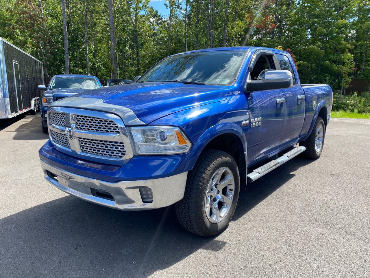 2014 RAM 1500 4WD Quad Cab 140.5" Laramie - Photo #1
