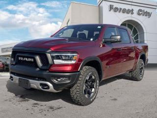 <b>Off-Road Suspension,  SiriusXM,  Apple CarPlay,  Android Auto,  Navigation!</b><br> <br>   Work, play, and adventure are what the 2023 Ram 1500 was designed to do. <br> <br>The Ram 1500s unmatched luxury transcends traditional pickups without compromising its capability. Loaded with best-in-class features, its easy to see why the Ram 1500 is so popular. With the most towing and hauling capability in a Ram 1500, as well as improved efficiency and exceptional capability, this truck has the grit to take on any task.<br> <br> This red pearl Crew Cab 4X4 pickup   has an automatic transmission and is powered by a  5.7L V8 16V MPFI OHV engine.<br> <br> Our 1500s trim level is Rebel. Bold and unapologetic, this Ram 1500 Rebel features beefy off-road suspension including Bilstein dampers, skid plates for underbody protection, gloss black wheels, front fog lamps, power-folding exterior mirrors with courtesy lamps, and black fender flares, with front bumper tow hooks. The standard features continue, with power-adjustable heated front seats with lumbar support, dual-zone climate control, power-adjustable pedals, deluxe sound insulation, and a leather-wrapped steering wheel. Connectivity is handled by an upgraded 8.4-inch display powered by Uconnect 5 with inbuilt navigation, mobile internet hotspot access, Apple CarPlay, Android Auto and SiriusXM streaming radio. Additional features include a power rear window with defrosting, class II towing equipment including a hitch, wiring harness and trailer sway control, heavy-duty suspension, cargo box lighting, and a locking tailgate. This vehicle has been upgraded with the following features: Off-road Suspension,  Siriusxm,  Apple Carplay,  Android Auto,  Navigation,  Heated Seats,  4g Wi-fi. <br><br> View the original window sticker for this vehicle with this url <b><a href=http://www.chrysler.com/hostd/windowsticker/getWindowStickerPdf.do?vin=1C6SRFLT9PN629140 target=_blank>http://www.chrysler.com/hostd/windowsticker/getWindowStickerPdf.do?vin=1C6SRFLT9PN629140</a></b>.<br> <br>To apply right now for financing use this link : <a href=https://www.forestcitydodge.ca/finance-center/ target=_blank>https://www.forestcitydodge.ca/finance-center/</a><br><br> <br/> 6.99% financing for 96 months.  Incentives expire 2023-10-02.  See dealer for details. <br> <br><br> Forest City Dodge proudly serves clients in London ON, St. Thomas ON, Woodstock ON, Tilsonburg ON, Strathroy ON, and the surrounding areas. Formerly known as Southwest Chrysler, Forest City Dodge has become a local automotive leader that takes pride in providing a transparent car buying experience and exceptional customer service throughout the dealership. </br>

<br> If you are looking to finance a vehicle, our finance department are seasoned professionals in ensuring that you get financing options that fits your budget and lifestyle. Regardless of your credit situation, our finance team will work hard to get you approved for a vehicle youre comfortable with in no time. We also offer a dedicated service department thats always ready to attend your needs. Our factory trained technicians will help keep your vehicle in the best shape possible so that your vehicle gets the most out of its lifespan. </br>

<br> We have a strong and committed team with many years of experience satisfying our customers needs. Feel free to browse our inventory online, request more information about our vehicles, or inquire about financing. Visit us today at or contact us now with any questions or concerns! </br>
<br> Come by and check out our fleet of 80+ used cars and trucks and 200+ new cars and trucks for sale in London.  o~o