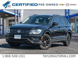 <b>17 inch Montana Alloy Wheels,  Apple CarPlay,  Android Auto,  KESSY Remote Keyless Entry,  6.5 in Touchscreen Radio!</b><br> <br>    Among crossover SUVs, this 2019 Volkswagen Tiguan stands out for its spacious and elegant interior. This  2019 Volkswagen Tiguan is for sale today in Kingston. <br> <br>The weekend warrior! As one of the most minimalist styled crossover SUVs, the Tiguan is the winner of elegance in its competition. Crisp lines, a luxurious ride quality and the largest interior within its class give this Tiguan the high marks as the leader of the crossover SUV segment.This  SUV has 125,670 kms. Its  nice in colour  . It has an automatic transmission and is powered by a  184HP 2.0L 4 Cylinder Engine.  <br> <br> Our Tiguans trim level is Trendline 4MOTION. This compact and fully capable Volkswagen Tiguan is loaded with full time all wheel drive, LED brake lights, body colored heated side mirrors with turn signals, elegant alloy wheels, a 6 speaker stereo with a 6.5 inch display, App-Connect smartphone integration, front adjustable bucket seats, remote keyless entry, cruise control, manual air conditioning, Bluetooth connectivity, front and rear cup holders, a rear view camera and much more. This vehicle has been upgraded with the following features: 17 Inch Montana Alloy Wheels,  Apple Carplay,  Android Auto,  Kessy Remote Keyless Entry,  6.5 In Touchscreen Radio. <br> <br>To apply right now for financing use this link : <a href=https://www.taylorautomall.com/finance/apply-for-financing/ target=_blank>https://www.taylorautomall.com/finance/apply-for-financing/</a><br><br> <br/><br> Buy this vehicle now for the lowest bi-weekly payment of <b>$168.24</b> with $0 down for 84 months @ 9.99% APR O.A.C. ( Plus applicable taxes -  Plus applicable fees   / Total Obligation of $30619  ).  See dealer for details. <br> <br>For more information, please call any of our knowledgeable used vehicle staff at (613) 549-1311!<br><br> Come by and check out our fleet of 90+ used cars and trucks and 140+ new cars and trucks for sale in Kingston.  o~o