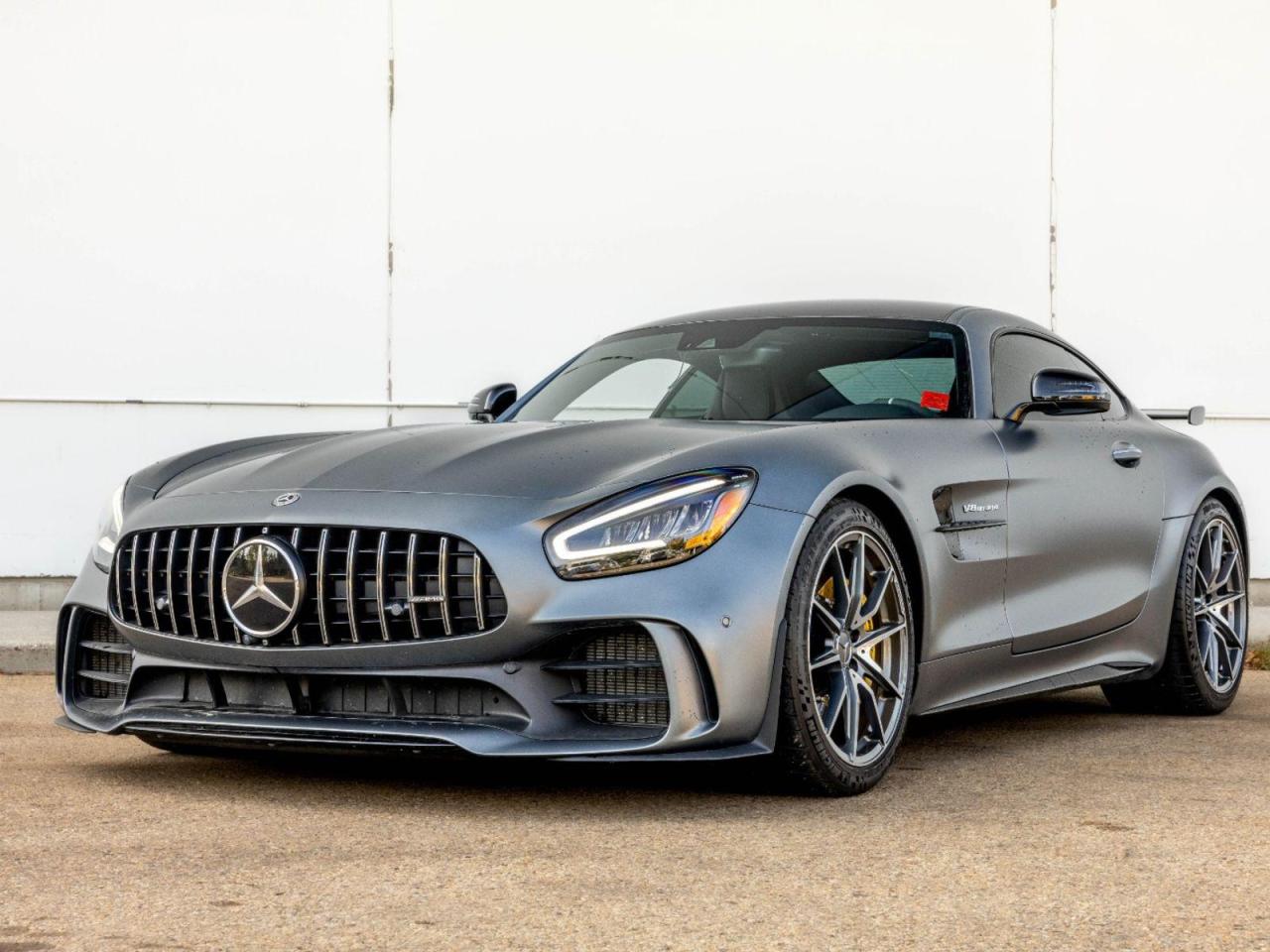 We are pleased to offer this local, one-owner, accident free 2020 Mercedes-Benz AMG GT R finished in Grey exterior with Black leather & Alcantara interior. Key features include: GT R trim, full vehicle matte wrap, heated Performance seats, Alcantara steering wheel w/ paddle shifters, navigation, dual-zone climate, sport exhaust, adaptive cruise, front axle lift, adjustable suspension (comfort/sport/sport+), extended leather trim, Carbon Fibre inlays, Burmester High End audio, 360-degree surround view cameras, push-button start, Carbon Fibre roof, Michelin Sport Cup 2 tires, and much more!Call/Text (587) 800-4384 for Immediate Response!We will take your vehicle in on trade, any vehicle, newer, older, all makes, models and conditions. We will even take your motorcycle or RV.A few reasons that set us apart as an exclusive luxury experience: valet service, Jaguar/Land Rover branded service loaners, and free pickup truck loaner availability.Proudly serving Edmonton and area along with the rest of Alberta and Western Canada for many years counting and many more to come.