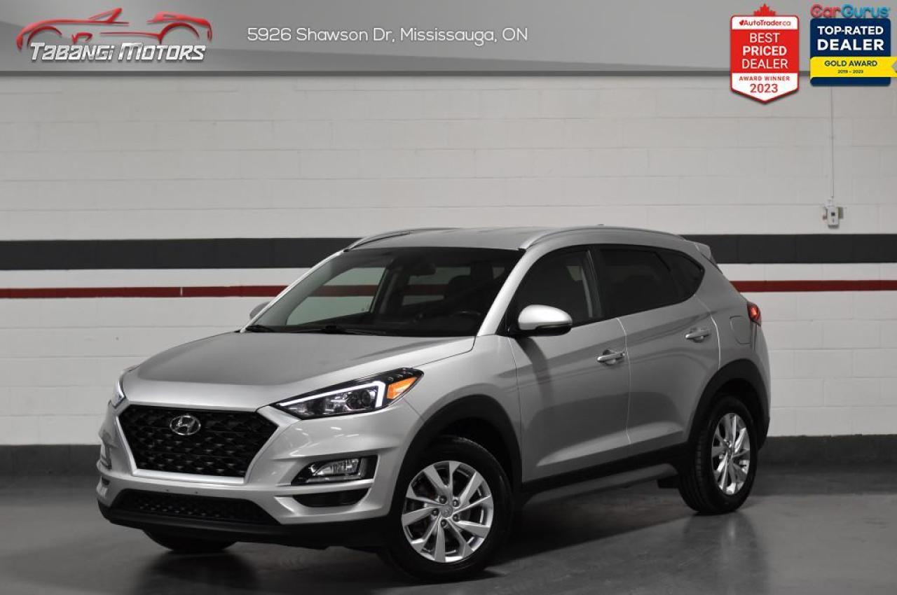 <b>Apple Carplay, Android Auto, Front and Rear Heated Seats, Heated Steering Wheel, Push Start, Blindspot Monitoring, Lane Departure Warning, lane Keep Assist, Forward Collison Warning!</b><br>  Tabangi Motors is family owned and operated for over 20 years and is a trusted member of the UCDA. Our goal is not only to provide you with the best price, but, more importantly, a quality, reliable vehicle, and the best customer service. Visit our new 25,000 sq. ft. building and indoor showroom and take a test drive today! Call us at 905-670-3738 or email us at customercare@tabangimotors.com to book an appointment. <br><hr></hr>CERTIFICATION: Have your new pre-owned vehicle certified at Tabangi Motors! We offer a full safety inspection exceeding industry standards including oil change and professional detailing prior to delivery. Vehicles are not drivable, if not certified. The certification package is available for $595 on qualified units (Certification is not available on vehicles marked As-Is). All trade-ins are welcome. Taxes and licensing are extra.<br><hr></hr><br> <br>   Full of amazing features, this 2020 Tucson is more than a capable and reliable family SUV, it represents the new wave of modern SUVs. This  2020 Hyundai Tucson is for sale today in Mississauga. <br> <br>2020 Hyundai Tucson is more than just a sport utility vehicle, its the SUV thats always up for your adventures. With innovative features to keep you connected like standard Apple CarPlay and Android Auto smartphone connectivity, capable and efficient performance and heaps of built-in safety features, its always ready when you are. This 2020 Hyundai Tucson is ready to show you what an affordable family SUV should be.This  SUV has 77,701 kms. Its  silver in colour  . It has a 6 speed automatic transmission and is powered by a  161HP 2.0L 4 Cylinder Engine.  This unit has some remaining factory warranty for added peace of mind. <br> <br> Our Tucsons trim level is Preferred. This Preferred trim is a great choice that comes with aluminum wheels, a blind spot detection system with rear cross traffic alerts and lane change assist, a heated leather wrapped steering wheel and drive mode select. You will also receive a 7 inch colour touch screen display with Apple CarPlay and Android Auto, LED daytime running lights, a 60/40 split rear seat, remote keyless entry and a rear view camera plus much more! This vehicle has been upgraded with the following features: Air, Rear Air, Tilt, Cruise, Power Windows, Power Locks, Power Mirrors. <br> <br>To apply right now for financing use this link : <a href=https://tabangimotors.com/apply-now/ target=_blank>https://tabangimotors.com/apply-now/</a><br><br> <br/><br><hr></hr>SERVICE: Schedule an appointment with Tabangi Service Centre to bring your vehicle in for all its needs. Simply click on the link below and book your appointment. Our licensed technicians and repair facility offer the highest quality services at the most competitive prices. All work is manufacturer warranty approved and comes with 2 year parts and labour warranty. Start saving hundreds of dollars by servicing your vehicle with Tabangi. Call us at 905-670-8100 or follow this link to book an appointment today! https://calendly.com/tabangiservice/appointment. <br><hr></hr>PRICE: We believe everyone deserves to get the best price possible on their new pre-owned vehicle without having to go through uncomfortable negotiations. By constantly monitoring the market and adjusting our prices below the market average you can buy confidently knowing you are getting the best price possible! No haggle pricing. No pressure. Why pay more somewhere else?<br><hr></hr>WARRANTY: This vehicle qualifies for an extended warranty with different terms and coverages available. Dont forget to ask for help choosing the right one for you.<br><hr></hr>FINANCING: No credit? New to the country? Bankruptcy? Consumer proposal? Collections? You dont need good credit to finance a vehicle. Bad credit is usually good enough. Give our finance and credit experts a chance to get you approved and start rebuilding credit today!<br> o~o