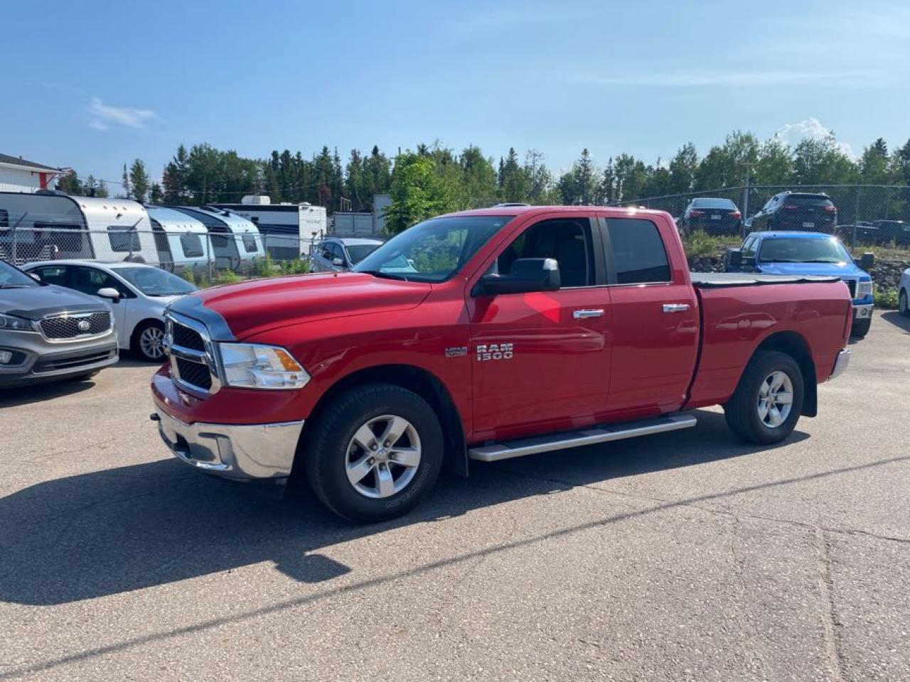 2014 RAM 1500 4WD Quad Cab 140.5" SLT - Photo #1