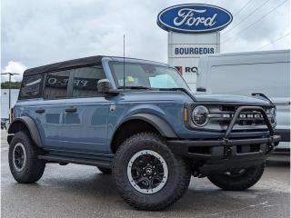 <b>Heated Seats, Ford Co-Pilot360, Remote Engine Start, Dual-Zone Electronic Climate Control, Sync 4!</b><br> <br> <br> <br>  With cool retro-styling, innovative features and impressive off-road capability, this legendary 2023 Ford Bronco has very little to prove. <br> <br>With a nostalgia-inducing design along with remarkable on-road driving manners with supreme off-road capability, this 2023 Ford Bronco is indeed a jack of all trades, and masters every one of them. Durable build materials and functional engineering coupled with modern day infotainment and driver assistive features ensure that this iconic vehicle takes on whatever you can throw at it. Want an SUV that can genuinely do it all and look good while at it? Look no further than this 2023 Ford Bronco!<br> <br> This azure gray metallic tricoat SUV  has a 10 speed automatic transmission and is powered by a  315HP 2.7L V6 Cylinder Engine.<br> <br> Our Broncos trim level is Big Bend. This Bronco Big Bend comes with unique aluminum wheels with a full-size spare, front fog lamps and a leather-wrapped steering wheel, in addition to fantastic standard features such as off-roading suspension, a comprehensive terrain management system with switchable drive modes, a manual convertible top with fixed rollover protection, a flip-up rear window, LED headlights with automatic high beams, and proximity keyless entry with push button start. Connectivity is handled by an 8-inch LCD screen powered by SYNC 4 with wireless Apple CarPlay and Android Auto, with SiriusXM satellite radio. Additional features include towing equipment including trailer sway control, pre-collision assist with pedestrian detection, forward collision mitigation, a rearview camera, and even more. This vehicle has been upgraded with the following features: Heated Seats, Ford Co-pilot360, Remote Engine Start, Dual-zone Electronic Climate Control, Sync 4. <br><br> View the original window sticker for this vehicle with this url <b><a href=http://www.windowsticker.forddirect.com/windowsticker.pdf?vin=1FMEE5DP0PLB87644 target=_blank>http://www.windowsticker.forddirect.com/windowsticker.pdf?vin=1FMEE5DP0PLB87644</a></b>.<br> <br>To apply right now for financing use this link : <a href=https://www.bourgeoismotors.com/credit-application/ target=_blank>https://www.bourgeoismotors.com/credit-application/</a><br><br> <br/> 4.99% financing for 84 months.  Incentives expire 2024-04-30.  See dealer for details. <br> <br>Discount on vehicle represents the Cash Purchase discount applicable and is inclusive of all non-stackable and stackable cash purchase discounts from Ford of Canada and Bourgeois Motors Ford and is offered in lieu of sub-vented lease or finance rates. To get details on current discounts applicable to this and other vehicles in our inventory for Lease and Finance customer, see a member of our team. </br></br>Discover a pressure-free buying experience at Bourgeois Motors Ford in Midland, Ontario, where integrity and family values drive our 78-year legacy. As a trusted, family-owned and operated dealership, we prioritize your comfort and satisfaction above all else. Our no pressure showroom is lead by a team who is passionate about understanding your needs and preferences. Located on the shores of Georgian Bay, our dealership offers more than just vehiclesits an experience rooted in community, trust and transparency. Trust us to provide personalized service, a diverse range of quality new Ford vehicles, and a seamless journey to finding your perfect car. Join our family at Bourgeois Motors Ford and let us redefine the way you shop for your next vehicle.<br> Come by and check out our fleet of 80+ used cars and trucks and 130+ new cars and trucks for sale in Midland.  o~o