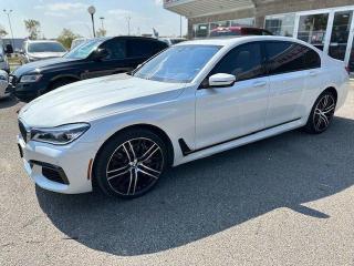 <div>Used | SUV | White | 2019 | BMW | 7 Series | 750Li xDrive | AWD | Heated Seats | Sunroof</div><div> </div><div>2019 BMW 750LI X-DRIVE AWD WITH 98994 KMS, NAVIGATION, 360 BACKUP CAMERA, BLUETOOTH, APPLE CARPLAY/ANDROID AUTO, BLIND SPOT DETECTION, HEADS UP DISPLAY, SUNROOF, HEATED STEERING WHEEL, PUSH BUTTON START, USB/AUX, PADDLE SHIFTERS, LANE ASSIST, DRIVE MODES, REAR SEAT CLIMATE, REAR SEAT TVS, AMBIENT LIGHTING, REAR SEAT TABLES/PRIVACY CURTAINS, HEATED SEATS, LEATHER SEATS, PARKING SENSORS, CD/RADIO, AC, POWER WINDOWS LOCKS SEATS AND MORE!</div>