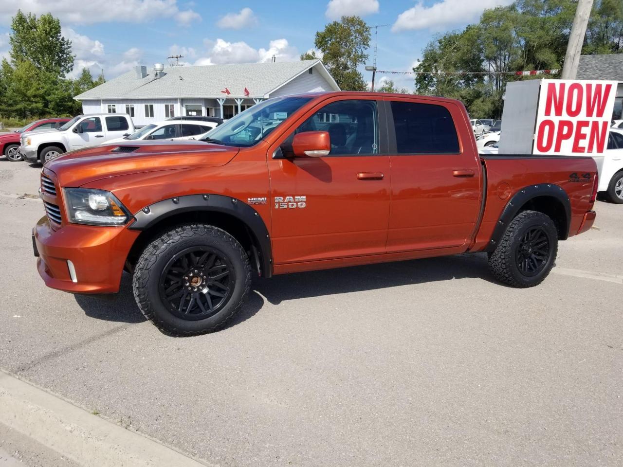 2013 RAM 1500 4WD Crew Cab 140.5" Sport - Photo #1