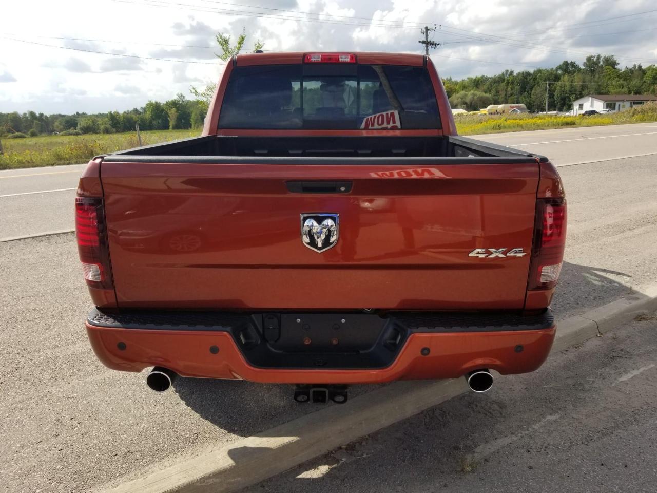 2013 RAM 1500 4WD Crew Cab 140.5" Sport - Photo #6