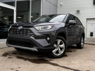Our inviting 2019 Toyota Rav4 Hybrid Limited is shown off in Magnetic Grey Metallic! Its powered by a 2.5 Liter 4 Cylinder engine that produces 176 horsepower while paired with a CVT. Its absolutely stunning with alloy wheels, rear roof spoiler, LED headlights, and chrome trimming. Inside our Limited, open the door to find a world of comfort and convenience with black leather seating, front heated/vented seats, driver memory settings, a leather-wrapped heated steering wheel with mounted audio/cruise controls (radar), all weather mats, and a power sunroof. It also has a wireless charger, navigation, dual-zone climate control, Apple CarPlay, and an impressive 6 speaker sound system.Our Toyota will give you peace of mind with its wide variety of safety features including a backup camera, a lane departure warning system, a forward collision warning system, dusk-sensing headlights, stability/traction control, an immense amount of airbags and more! Print this page and call us Now... We Know You Will Enjoy Your Test Drive Towards Ownership! We look forward to showing you why Go Mazda is the best place for all your automotive needs.Go Mazda is an AMVIC licensed business. Please note: this vehicle is showing a CarFax incident in the amount of $1,628.61