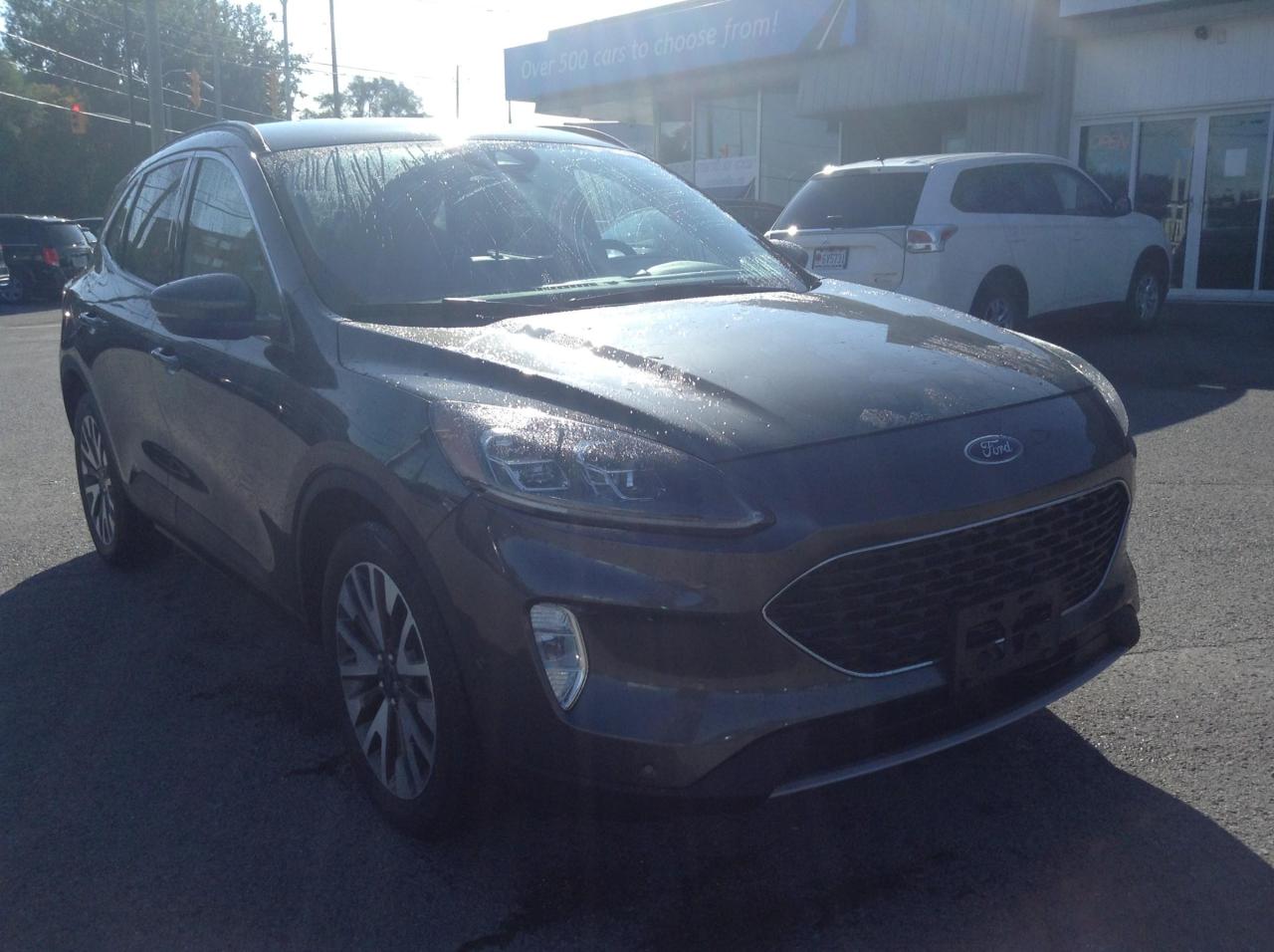 Used 2020 Ford Escape Titanium Hybrid TITANIUM HYBRID !!! LANE ASSIST. ALLOYS. HEATED SEATS. LEATHER. NAV. WOOD TRIM. BLIND SPOT-ASSIST. P for sale in Kingston, ON