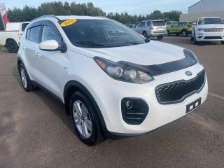 <span>This 2018 Kia Sportage LX AWD is stylish, spacious, efficient, affordable, and most of all, capable. The Sportages Dynamax intelligent all-wheel-drive reacts to wheel slippage but goes a step further by anticipating a loss of grip and shuffling power proactively.</span>




<span>Combine the Sportages all-wheel-drive effectiveness with great ride height and its huge cargo area (868 litres) and this Kias all-around usefulness is obvious. Yet the Sportage is also very nicely featured: heated seats, rearview camera, Bluetooth, keyless entry, satellite radio compatibility, aux/USB input, air conditioning, and alloy wheels.</span>




<span style=font-weight: 400;>Thank you for your interest in this vehicle. Its located at Centennial Honda, 610 South Drive, Summerside, PEI. We look forward to hearing from you; call us toll-free at 1-902-436-9158.</span>