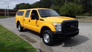 2012 Ford F-250 XL Crew Cab Short Box Diesel 4WD with Canopy, 6.7L V8 OHV 16V DIESEL engine, 8 cylinder, 4 door, automatic, 4WD, 4-Wheel ABS, cruise control, AM/FM radio, CD player, power door locks, power windows, power mirrors, yellow exterior, black interior. $29,910.00 plus $375 processing fee, $30,285.00 total payment obligation before taxes.  Listing report, warranty, contract commitment cancellation fee, financing available on approved credit (some limitations and exceptions may apply). All above specifications and information is considered to be accurate but is not guaranteed and no opinion or advice is given as to whether this item should be purchased. We do not allow test drives due to theft, fraud and acts of vandalism. Instead we provide the following benefits: Complimentary Warranty (with options to extend), Limited Money Back Satisfaction Guarantee on Fully Completed Contracts, Contract Commitment Cancellation, and an Open-Ended Sell-Back Option. Ask seller for details or call 604-522-REPO(7376) to confirm listing availability.