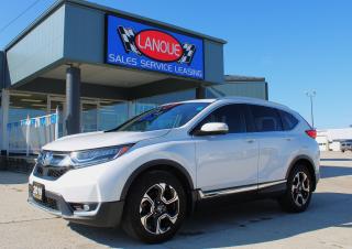 <p style=text-align: center; line-height: 1;><span style=font-size: 18pt;><em><strong><span style=font-family: arial, helvetica, sans-serif;>2019 HONDA CR-V TOURING AWD</span></strong></em></span></p><p style=text-align: center; line-height: 1;><em><strong><span style=font-family: arial, helvetica, sans-serif; font-size: 18pt;>DRIVETRAIN & MECHANICAL</span></strong></em></p><p style=text-align: center; line-height: 1;><span style=font-family: arial, helvetica, sans-serif; font-size: 14pt;>1.5-L Turbocharged 4-Cylinder Engine.</span></p><p style=text-align: center; line-height: 1;><span style=font-family: arial, helvetica, sans-serif; font-size: 14pt;>w/ Direct Injection, Eco Assist™ System, Drive-By-Wire Throttle System™, & ECON Mode.</span></p><p style=text-align: center; line-height: 1;><span style=font-family: arial, helvetica, sans-serif; font-size: 14pt;>190-HORSEPOWER @ 5600 Rpm & 179-LB.-FT. OF TORQUE @ 2000-5000 Rpm.</span></p><p style=text-align: center; line-height: 1;><span style=font-family: arial, helvetica, sans-serif; font-size: 14pt;>Continuously-Variable Transmission.</span></p><p style=text-align: center; line-height: 1;><span style=font-family: arial, helvetica, sans-serif; font-size: 14pt;>Real-Time AWD™ w/ Intelligent Control System™.</span></p><p style=text-align: center; line-height: 1;><span style=font-family: arial, helvetica, sans-serif; font-size: 14pt;>18 Aluminum-Alloy Wheels w/ P235/60-R18 All-Season Tires.</span></p><p style=text-align: center; line-height: 1;><span style=font-family: arial, helvetica, sans-serif; font-size: 14pt;>Capless Fueling System, Compact Spare Tire, Electronic Parking Brake (EPB) w/ Automatic Brake Hold, MacPherson Strut Front Suspension, Motion-Adaptive Electric Power-Assisted Rack-&-Pinion Steering (EPS), Multi-Link Rear Suspension, Front & Rear Stabilizer bars.</span></p><p style=text-align: center; line-height: 1;><strong><em><span style=font-family: arial, helvetica, sans-serif; font-size: 18pt;>FUEL ECONOMY</span></em></strong></p><p style=text-align: center; line-height: 1;><span style=font-family: arial, helvetica, sans-serif; font-size: 14pt;>COMBINED - 8.0 L/100 KM.</span></p><p style=text-align: center; line-height: 1;><span style=font-family: arial, helvetica, sans-serif; font-size: 14pt;>HIGHWAY - 7.2 L/100 KM & </span><span style=font-family: arial, helvetica, sans-serif; font-size: 14pt;>CITY - 8.7 L/100 KM.</span></p><p style=text-align: center; line-height: 1;><em><strong><span style=font-family: arial, helvetica, sans-serif; font-size: 18pt;>ACTIVE SAFETY</span></strong></em></p><p style=text-align: center; line-height: 1;><span style=font-family: arial, helvetica, sans-serif; font-size: 14pt;>Brake Assist, Automatic High-Beam (ON/OFF), Collision Mitigation Braking System™ (CMBS®), Forward Collision Warning (FCW) System, Lane-Departure Warning (LDW) System, Electronic Brake-Force Distribution (EBD), 4-Wheel Disc Anti-Lock Braking System (ABS), Hill Start Assist, LED Daytime Running Lights, Tire Pressure Monitoring System (TPMS), Road-Departure Mitigation (RDM) System, Vehicle Stability Assist (VSA®) w/ Traction Control.</span></p><p style=text-align: center; line-height: 1;><em><strong><span style=font-family: arial, helvetica, sans-serif; font-size: 18pt;>PASSIVE SAFETY</span></strong></em></p><p style=text-align: center; line-height: 1;><span style=font-family: arial, helvetica, sans-serif; font-size: 14pt;>HondaLink™ Assist Automatic Emergency Response System, Lower Anchors & Tethers for CHildren (LATCH), Next-Generation Advanced Compatibility Engineering™ (ACE™) Body Structure, SmartVent™ Side Airbags, Side Curtain Airbags w/ Rollover Sensor System, </span><span style=font-family: arial, helvetica, sans-serif; font-size: 18.6667px;>3-Point Rear Seat Belts, 3-Point Height-Adjustable Seat Belts w/ Front Automatic Tensioning System, Child-Proof Rear Door Locks, i-SRS Airbag System (Front).</span></p><p style=text-align: center; line-height: 1;><span style=font-size: 18pt;><em><strong><span style=font-family: arial, helvetica, sans-serif;>DRIVER ASSIST TECHNOLOGY</span></strong></em></span></p><p style=text-align: center; line-height: 1;><span style=font-family: arial, helvetica, sans-serif; font-size: 14pt;>Adaptive Cruise Control (ACC) w/ Low-Speed Follow, Blind-Spot Information (BSI) System w/ Rear Cross-Traffic Monitor System, Lane-Keeping Assist System (LKAS).</span></p><p style=text-align: center; line-height: 1;><span style=font-size: 18pt;><em><strong><span style=font-family: arial, helvetica, sans-serif;>EXTERIOR FEATURES</span></strong></em></span></p><p style=text-align: center; line-height: 1;><span style=font-family: arial, helvetica, sans-serif; font-size: 14pt;>Panoramic Moonroof, Power Tailgate w/ Programmable Height & Hands-Free Access, Rain-Sensing Windshield Wipers, Active Shutter Grill, Body-Colored Door Handles, Fog Lights, Front & Rear Splash Guards, Front Wiper Deicer, Body-Colored Heated Power-Adjustable Exterior Mirrors w/ Integrated Turn-Signal Indicators & Folding Door Mirrors, LED Headlights (High & Low Beam) w/ Automatic ON/OFF, Roof Rails, Dual Exhaust w/ Chrome Finisher.</span></p><p style=text-align: center; line-height: 1;><strong><em><span style=font-family: arial, helvetica, sans-serif; font-size: 18pt;>INFOTAINMENT & CONNECTIVITY</span></em></strong></p><p style=text-align: center; line-height: 1;><span style=font-family: arial, helvetica, sans-serif; font-size: 14pt;>7 Display Audio System w/ Honda Satellite-Linked Navigation System™ & Bilingual Voice Recognition, AM/FM Premium Audio System w/ MP3/Windows Media® Audio Playback Capability & 9 Speakers Including </span><span style=font-family: arial, helvetica, sans-serif; font-size: 18.6667px;>331-Watt </span><span style=font-family: arial, helvetica, sans-serif; font-size: 14pt;>Subwoofer, Bluetooth® Streaming Audio, Apple CarPlay™ & Android Auto™, HD Radio™, Siri Eyes-Free Compatibility</span><span style=font-family: arial, helvetica, sans-serif; font-size: 18.6667px;>, SiriusXM™, Wi-Fi Tethering, </span><span style=font-family: arial, helvetica, sans-serif; font-size: 14pt;>Speed-Sensitive Volume Control (SVC), Front USB Charge/Data Port(s): 2 Ports; 1.0-& 1.5-Amp. Rear USB Charging Ports: 2 Ports; 2.5 Amp.</span></p><p style=text-align: center; line-height: 1;><strong><span style=font-size: 14pt; font-family: arial, helvetica, sans-serif;>Here at Lanoue/Amfar Sales, Service & Leasing in Tilbury, we take pride in providing the public with a wide variety of High-Quality Pre-owned Vehicles. We recondition and certify our vehicles to a level of excellence that exceeds the Status Quo. We treat our Customers like family and provide the highest level of service from Start to Finish. If you’d like a smooth & stress-free car shopping experience, give one of our Sales Associates a call at 1-844-682-3325 to help you find your next NEW-TO-YOU vehicle!</span></strong></p><p style=text-align: center; line-height: 1;><strong><span style=font-size: 14pt; font-family: arial, helvetica, sans-serif;>Although we try to take great care in being accurate with the information in this listing, from time to time, errors occur. The vehicle is priced as it is physically equipped. Minor variances will not effect pricing. Please verify the vehicle is As Expected when you visit. Thank You!</span></strong></p>