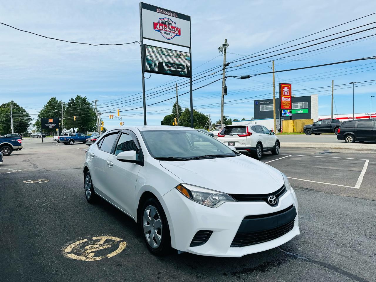2014 Toyota Corolla LE 4dr Sdn CVT - Photo #1