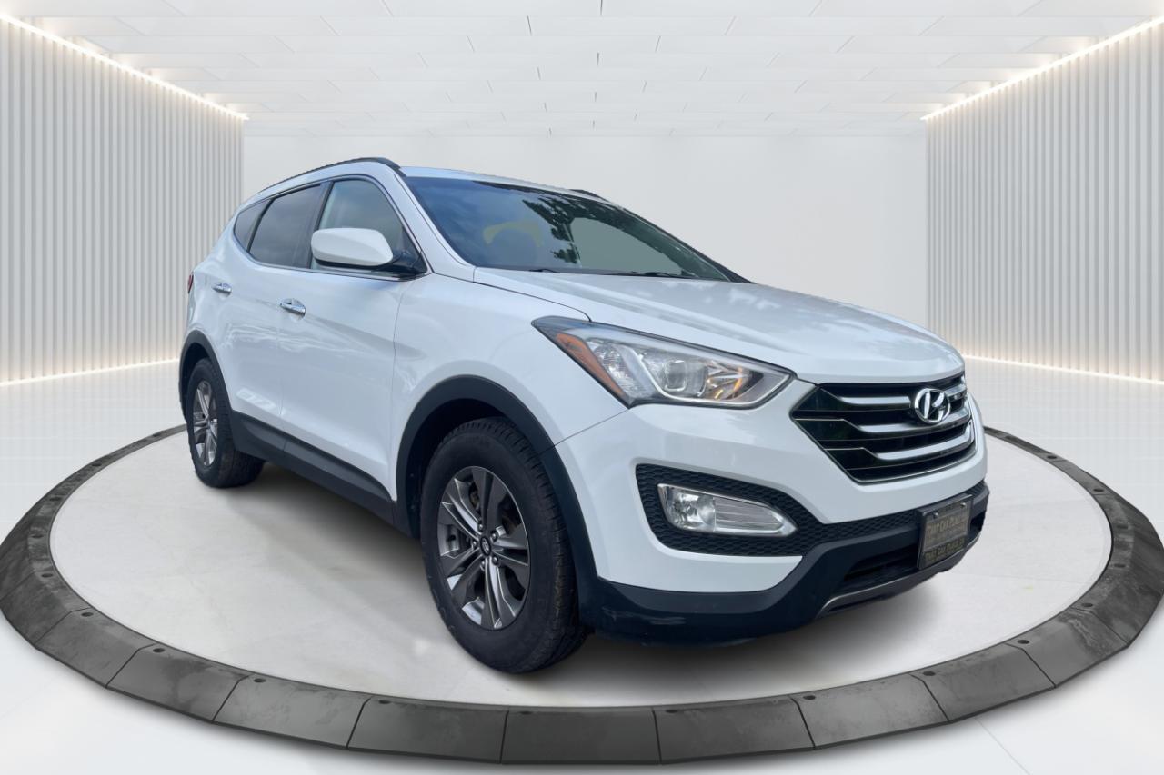  2015 HYUNDAI SANTA FE SPORT 2.0T AWD Save time money, and frustration with our transparent, no hassle pricing. Using the latest technology, we shop the competition for you and price our pre-owned vehicles to give you the best value, upfront, every time and back it up with a free market value report so you know you are getting the best deal! With no additional fees, theres no surprises either, the price you see is the price you pay, just add HST! We offer 50+ Vehicles on site with financing for our customers regardless of credit. We have a dedicated team of credit rebuilding experts on hand to help you get into the car of your dreams. We need your trade-in! We have a hassle free top dollar trade process and offer a free evaluation on your car. We will buy your vehicle even if you do not buy one from us! THAT CAR PLACE - Been in business for 27 years, we are OMVIC Certified and Member of UCDA earning your trust so you can buy with confidence. 50+ VEHICLES! ONE LOCATION! USED VEHICLE MARKET PRICING! We use an exclusive 3rd party marketing tool that accurately monitors vehicle prices to guarantee our customers get the best value. OUR POLICY!  Zero Pressure and Hassle-Free sales staff. Zero Hidden Admin Fees. Just honesty and integrity at no additional charge! HISTORY: Free Carfax report included with every vehicle. AWARDS: National Dealer of the Year Winner of Outstanding Customer Satisfaction Voted #1 Best Used Car Dealership in London, Ont. 2014 to 2024 Winner of Top Choice Award 6 years from 2015 to 2024 Winner of Londons Readers Choice Award 2014 to 2023 A+ Accredited Better Business Bureau rating FULL SAFETY: Full safety inspection exceeding industry standards all vehicles go through an intensive inspection RECONDITIONING: Any Pads or Rotors below 50% material will be replaced. You will receive a semi-synthetic oil-lube-filter and cleanup. *Our Staff put in the most effort to ensure the accuracy of the information listed above. Please confirm with a sales representative to confirm the accuracy of this information* Save time money, and frustration with our transparent, no hassle pricing. Using the latest technology, we shop the competition for you and price our pre-owned vehicles to give you the best value, upfront, every time and back it up with a free market value report so you know you are getting the best deal! With no additional fees, theres no surprises either, the price you see is the price you pay, just add HST! We offer 50+ Vehicles on site with financing for our customers regardless of credit. We have a dedicated team of credit rebuilding experts on hand to help you get into the car of your dreams. We need your trade-in! We have a hassle free top dollar trade process and offer a free evaluation on your car. We will buy your vehicle even if you do not buy one from us! THAT CAR PLACE - Been in business for 27 years, we are OMVIC Certified and Member of UCDA earning your trust so you can buy with confidence. 50+ VEHICLES! ONE LOCATION! USED VEHICLE MARKET PRICING! We use an exclusive 3rd party marketing tool that accurately monitors vehicle prices to guarantee our customers get the best value. OUR POLICY!  Zero Pressure and Hassle-Free sales staff. Zero Hidden Admin Fees. Just honesty and integrity at no additional charge! HISTORY: Free Carfax report included with every vehicle. AWARDS: National Dealer of the Year Winner of Outstanding Customer Satisfaction Voted #1 Best Used Car Dealership in London, Ont. 2014 to 2024 Winner of Top Choice Award 6 years from 2015 to 2024 Winner of Londons Readers Choice Award 2014 to 2023 A+ Accredited Better Business Bureau rating FULL SAFETY: Full safety inspection exceeding industry standards all vehicles go through an intensive inspection RECONDITIONING: Any Pads or Rotors below 50% material will be replaced. You will receive a semi-synthetic oil-lube-filter and cleanup. *Our Staff put in the most effort to ensure the accuracy of the information listed above. Please confirm with a sales representative to confirm the accuracy of this information*