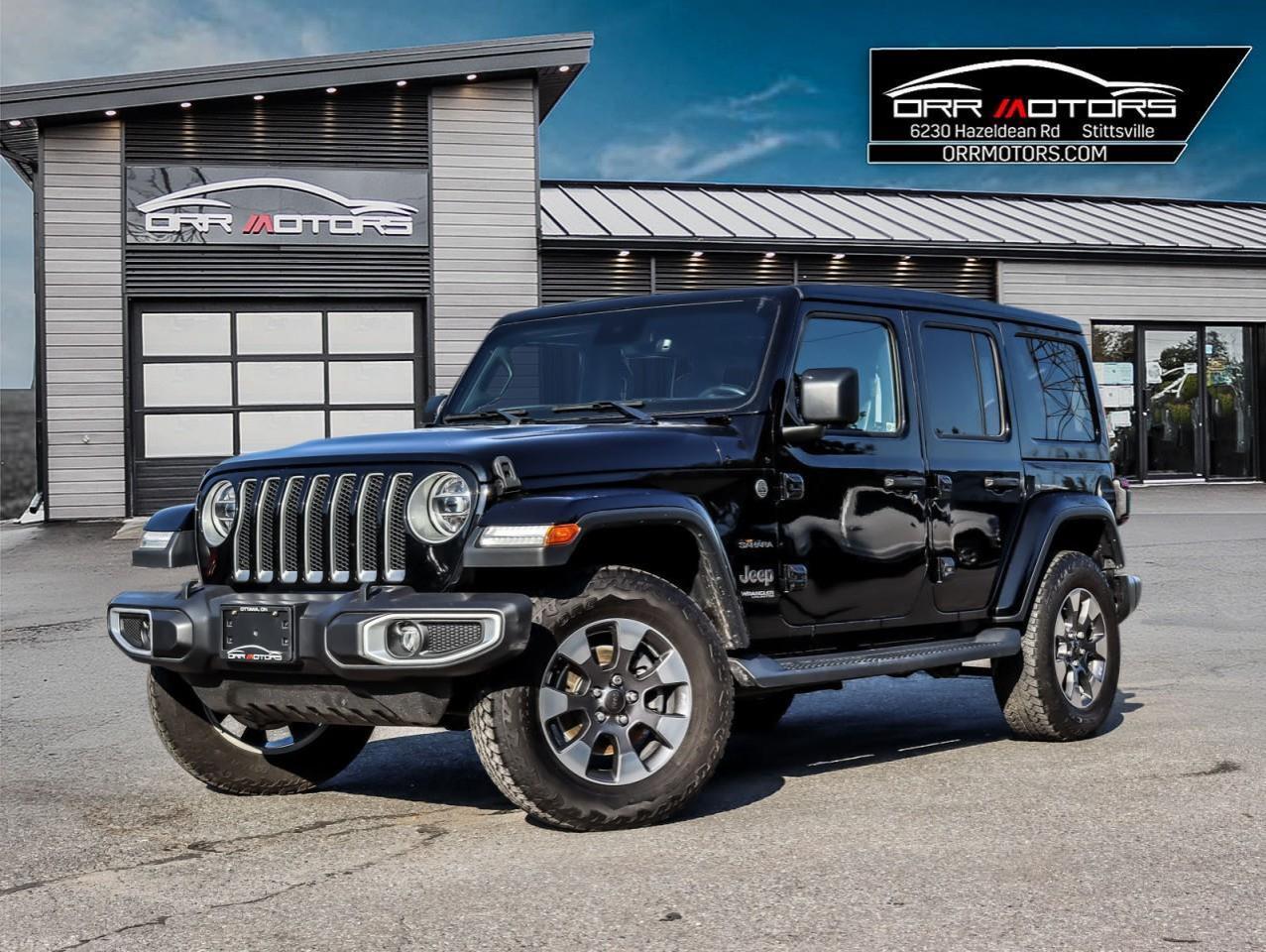 <div>TOP OF THE LINE SAHARA!! COMES LOADED WITH LEATHER SEATS, COLD WEATHER GROUP, LED LIGHTING GROUP, SOUND GROUP, SAFETY TEC GROUP, ADVANCED SAFETY GROUP, 8 SPEED TRANSMISSION WITH DANA M200 REAR AXLE, TRAC-LOK ANTI-SPIN DIFF, SKY POWER SOFT TOP AND MUCH MORE! </div><div><br /></div><div>SOLD CERTIFIED AND IN EXCELLENT CONDITION.</div>
**Advertised price is for finance purchase only, Cash purchase price is $2000 more. 
<br />
*Every reasonable effort is made to ensure the accuracy of the information listed above. Vehicle pricing, incentives, options (including standard equipment), and technical specifications listed is for the Year, Make and Model of the vehicle, and may not match the exact vehicle displayed. Please confirm with a sales representative the accuracy of this information.<p><em>**Advertised price is for finance purchase only, Cash purchase price is $2000 more.</em></p>
