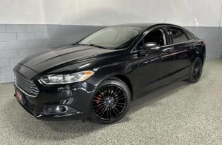 <p>~DEAL PENDING~2014 FORD FUSION SE SEDAN BLACK ON BLACK LEATHER INTERIOR! CLEAN CARFAX REPORT WITH NO ACCIDENTS OR INSURANCE CLAIMS! </p>
<p>EQUIPPED WITH AUTOMATIC TRANSMISSION, 4 CYLINDER ENGINE, LEATHER INTERIOR, BLUETOOTH CONNECTIVITY, NAVIGATION, BACKUP CAMERA, USB/AUX INPUT, HEATED FRONT SEATS, FOG LIGHTS, PARKING SENSORS, MEMORY SEAT, KEYLESS ENTRY, TINTED WINDOWS AND MORE. </p>
<p>**NEW TIMING BELT SERVICE JUST COMPLETED WITH RECEIPT**</p>
<p>FINANCING AND EXTENDED POWERTRAIN WARRANTY ARE AVAILABLE, WE ALSO OFFER HIGH MARKET VALUE FOR YOUR TRADE-IN. PLEASE CONTACT US FOR MORE DETAILS. </p>
<p> </p>
<p> </p>
<p>2013,2014,2015,2016,2017,2018</p><br><p>~~~~~~~~~~~~~~~~~~~~~~~~~~~</p>
<p>**WE ARE OPEN BY APPOINTMENT ONLY**</p>
<p>~~~~~~~~~~~~~~~~~~~~~~~~~~~</p>
<p>To our Valued Clients,</p>
<p>AutoRover is OPEN ‘BY APPOINTMENT ONLY’ until further notice.<br />PLEASE CALL 416-654-3413 to discuss availability and schedule your viewing MONDAY - THURSDAY 11-6 PM / FRIDAY 11-5PM / SATURDAY 11-4PM. </p>
<p>~~~~~~~~~~~~~~~~~~~~~~~~~~~</p>
<p>~ALL VEHICLES SOLD ‘SAFETY CERTIFIED’ and ‘ROAD-READY’ for a flat fee of $995 plus hst~PARTS & LABOR INCLUDED~</p>
<p>**If not Certified, as per OMVIC regulation, this vehicle is UNFIT, NOT DRIVABLE and NOT PRESENTED AS BEING IN ROADWORTHY CONDITION, MECHANICALLY SOUND OR MAINTAINED AT ANY GUARANTEED LEVEL OF QUALITY**</p>
<p>~~~~~~~~~~~~~~~~~~~~~~~~~</p>
<p>***CELEBRATING 27 YEARS IN BUSINESS***</p>
<p>VISIT US@ 4521 CHESSWOOD DR. NORTH YORK M3J 2V6 or CALL US @ 416-654-3413 for more details.</p>
<p> </p>
<p>~We SERVICE what we SELL~<br /><br /></p>