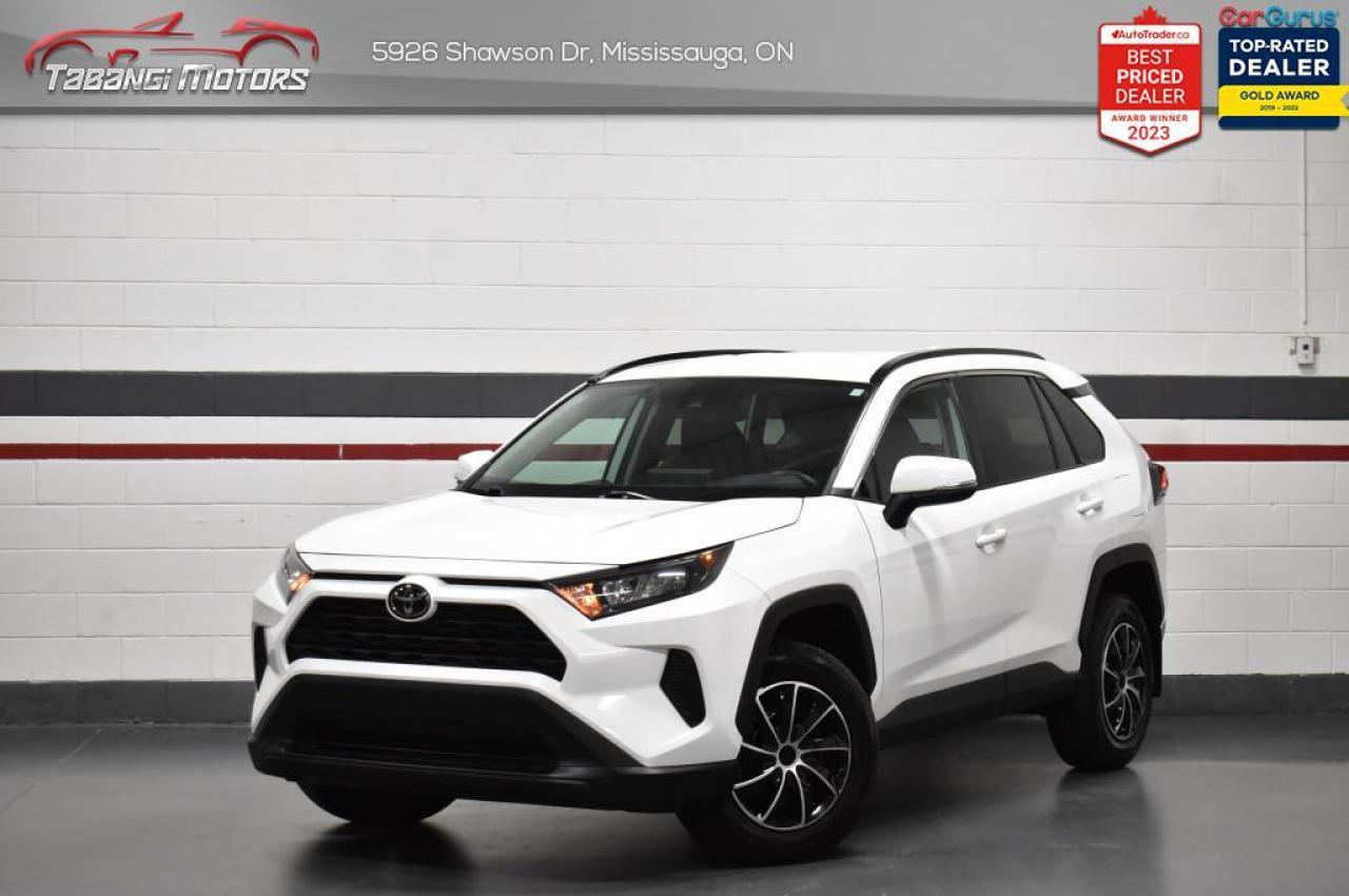 <b>Apple Carplay, Android Auto, Heated Seats, Backup Camera, Lane Keep Assist, Blindspot Assist, Adaptive Cruise Control! Former Daily Rental!</b><br>  Tabangi Motors is family owned and operated for over 20 years and is a trusted member of the UCDA. Our goal is not only to provide you with the best price, but, more importantly, a quality, reliable vehicle, and the best customer service. Visit our new 25,000 sq. ft. building and indoor showroom and take a test drive today! Call us at 905-670-3738 or email us at customercare@tabangimotors.com to book an appointment. <br><hr></hr>CERTIFICATION: Have your new pre-owned vehicle certified at Tabangi Motors! We offer a full safety inspection exceeding industry standards including oil change and professional detailing prior to delivery. Vehicles are not drivable, if not certified. The certification package is available for $595 on qualified units (Certification is not available on vehicles marked As-Is). All trade-ins are welcome. Taxes and licensing are extra.<br><hr></hr><br> <br>   The Toyota RAV4 is here to help you squeeze more out of your busy lifestyle. This  2021 Toyota RAV4 is for sale today in Mississauga. <br> <br>Introducing the Toyota RAV4, a radical redesign of a storied legend. While the RAV4 is loaded with modern creature comforts, conveniences, and safety, this SUV is still true to its roots with incredible capability. Whether youre running errands in the city or exploring the countryside, the RAV4 empowers your ambitions and redefines what you can do. Make new and exciting memories in this ultra efficient Toyota RAV4 today! This  SUV has 71,898 kms. Its  white in colour  . It has a 8 speed automatic transmission and is powered by a  203HP 2.5L 4 Cylinder Engine.  This unit has some remaining factory warranty for added peace of mind. <br> <br> Our RAV4s trim level is LE. This RAV4 LE comes with some impressive features such as sport, ECO & normal driving modes, a 7 inch touchscreen with Entune Audio 3.0, Apple CarPlay, Android Auto, USB and aux inputs, heated front seats, remote keyless entry, steering wheel with audio controls and a rear view camera. Additional features includes LED headlights, heated power mirrors, Toyota Safety Sense 2.0, dynamic radar cruise control, automatic highbeam assist, blind spot monitoring with rear cross traffic alert, and lane keep assist with lane departure warning plus much more. This vehicle has been upgraded with the following features: Air, Tilt, Cruise, Power Windows, Power Locks, Power Mirrors, Back Up Camera. <br> <br>To apply right now for financing use this link : <a href=https://tabangimotors.com/apply-now/ target=_blank>https://tabangimotors.com/apply-now/</a><br><br> <br/><br><hr></hr>SERVICE: Schedule an appointment with Tabangi Service Centre to bring your vehicle in for all its needs. Simply click on the link below and book your appointment. Our licensed technicians and repair facility offer the highest quality services at the most competitive prices. All work is manufacturer warranty approved and comes with 2 year parts and labour warranty. Start saving hundreds of dollars by servicing your vehicle with Tabangi. Call us at 905-670-8100 or follow this link to book an appointment today! https://calendly.com/tabangiservice/appointment. <br><hr></hr>PRICE: We believe everyone deserves to get the best price possible on their new pre-owned vehicle without having to go through uncomfortable negotiations. By constantly monitoring the market and adjusting our prices below the market average you can buy confidently knowing you are getting the best price possible! No haggle pricing. No pressure. Why pay more somewhere else?<br><hr></hr>WARRANTY: This vehicle qualifies for an extended warranty with different terms and coverages available. Dont forget to ask for help choosing the right one for you.<br><hr></hr>FINANCING: No credit? New to the country? Bankruptcy? Consumer proposal? Collections? You dont need good credit to finance a vehicle. Bad credit is usually good enough. Give our finance and credit experts a chance to get you approved and start rebuilding credit today!<br> o~o