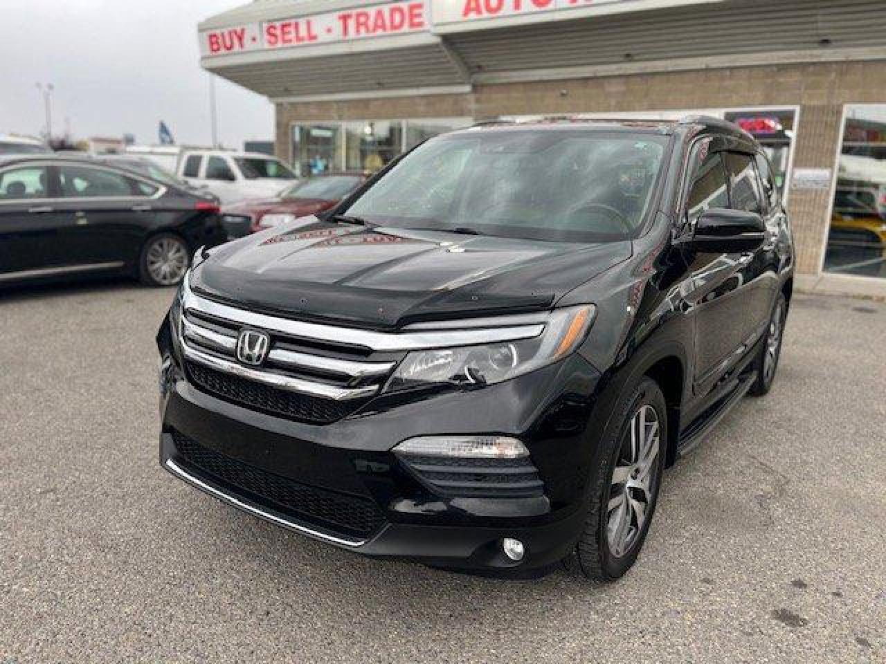 Used 2016 Honda Pilot Touring AWD 7 PASSENGERS NAVIGATION BACKUP CAMERA BLUETOOTH for sale in Calgary, AB