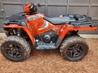 <p>1-Owner, Financing Available & Trade-ins Welcome!</p><p>Premium Orange Rust, Automotive style paint with custom graphics.</p><p>THE BEST-SELLING SPORTSMAN OF ALL TIME</p><p>LEGENDARY TOUGH SPORTSMAN 570s</p><p>The best-selling Automatic 4x4 ATV of all time is back with epic riding and legendary handling.</p><p>RIDE HARDER</p><p>Legendary Sportsman® riding and handling allow you to navigate the tightest corners and conquer the toughest terrain. Independent Rear Suspension and an industry-best 9.25” of suspension travel keep you riding comfortably and confidently all-day long.</p><p>GO FURTHER</p><p>The rider-inspired design takes you further down the trail with 11” of obstacle-dominating ground clearance. The industry’s fastest-engaging all-wheel drive (AWD) pulls you around corners and over rocks without stopping.</p><p>DO MORE</p><p>Handle any task in confidence with the 2020 factory-installed receiver hitch and up to 1,500 lb in towing capacity. Get 485 lb payload capacity and a combined 270 lb front & rear rack capacity.</p><p>High Output Electric Power Steering</p><p>Engine Braking System (EBS)</p><p> </p>
