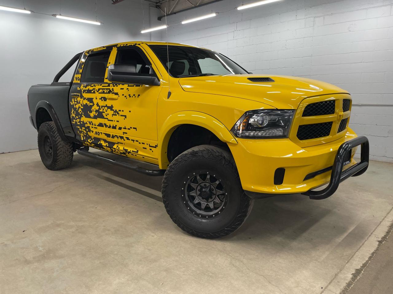 <p class=MsoNormal>2018 Ram 1500 Sport 4x4 crew cab with 6.4 box super rare. 6 inch BDS lift, Brand New 37x12.5x17 Fuel gripper MT tires, Dirty Life wheels, heavy duty airlift airbags in rear, JBA long tube headers, Carven muffler<span style=font-size: 1em;>, Aires powder coated side steps, Bushwacker smooth fender flares, go rhino roll bar, drilled and slotted rotors with heavy duty pads, access, tunnel cover, tailgate assist shock, LED 3rd brake light, LED fog lights, LED interior lights, bull bar, 120L tank, 3.92 gears, custom paint and wrap, truck is fully loaded with leather nav, sunroof, alpine stereo, k&n CAI, custom headliner with yellow diamond stitching, under coated every year.</span></p><p class=MsoNormal><span style=font-size: 1em;>Troys Toys: Guelphs Largest Indoor Showroom - Over 150 pre-owned vehicles and new cargo trailers in stock - All vehicles are certified unless stated AS IS - CarProof reports available for ALL vehicles - Certified vehicles eligible for 3mo. 3yr. warranty (some conditions apply) **Prices do not include sales tax and licensing** Visit us online at www.troystoys.net - Certified Canadian Trailer Company Dealer - - Custom built or stock product available - 3 year manufacturers warranty **Prices do not include sales tax and registration** View the products online at www.canadiantrailercompany.net Financing options available!(see store for details) - Good Credit, Bad Credit, No Credit *SEE STORE FOR DETAILS*</span></p>