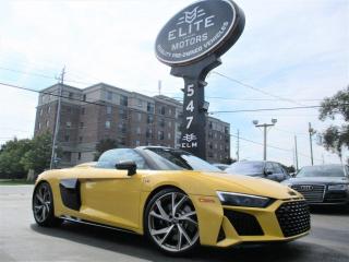 NO LUXURY TAX - Last of the V10 R8s - 2023 AUDI R8 V10 PERFORMANCE SPYDER <BR> _______________________________________________<BR><BR>Color: Vegas Yellow<BR>Interior: Black<BR>Engine: 5.2L V10, <BR>Transmission: Automatic<BR>_______________________________________________<BR><BR>HISTORY<BR>-No Accidents, Clean Carfax<BR>-One Owner<BR>-Last of the V10 R8s<BR><BR>_______________________________________________<BR><BR>FINANCING - Financing is available! Bad Credit? No Credit? Bankrupt? Well help you rebuild your credit! Low finance rates are available! (Based on Credit rating and On Approved Credit) we also have financing options available starting at @7.99% O.A.C All credits are approved, bad, Good, and New!!! Credit applications are available on our website. Approvals are done very quickly. The same Day Delivery Options are also available.<BR>_______________________________________________<BR><BR>PRICE - We know the price is important to you which is why our vehicles are priced to put a smile on your face. Prices are plus HST and licensing. Free CarFax Canada with every vehicle!<BR>_______________________________________________<BR><BR>CERTIFICATION PACKAGE - We take your safety very seriously! Each vehicle is PRE-SALE INSPECTED by licensed mechanics (50-point inspection) Certification package can be purchased for only FIVE HUNDRED AND NINETY-FIVE DOLLARS, if not Certified then as per OMVIC Regulations the vehicle is deemed to be not drivable, and not certified<BR>_______________________________________________<BR><BR>WARRANTY - Here at Elite Luxury Motors, we offer extended warranties for any make, model, year, or mileage. from 3 months to 4 years in length. Coverage ranges from powertrain (engine, transmission, differential) to Comprehensive warranties that include many other components. We have chosen to partner with Lubrico Warranty, the longest-serving warranty provider in Canada. All warranties are fully insured and every warranty over two years in length comes with the If you dont use it, you wont lose it guarantee. We have also chosen to help our customers protect their financed purchases by making Assureway Gap coverage available at a great price. At Elite Luxury, we are always easy to talk to and can help you choose the coverage that best fits your needs.<BR>_______________________________________________<BR><BR>TRADE - Got a vehicle to trade? We take any year and model! Drive it in and have our professional appraiser look at it!<BR>_______________________________________________<BR><BR>NEW VEHICLES DAILY COME VISIT US AT 547 PLAINS ROAD EAST IN BURLINGTON ONTARIO AND TAKE ADVANTAGE OF TOP-QUALITY PRE-OWNED VEHICLES. WE ARE ONTARIO REGISTERED DEALERS BUY WITH CONFIDENCE **<BR>_______________________________________________<BR><BR>If you have questions about us or any of our vehicles or if you would like to schedule a test drive, feel free to stop by, give us a call, or contact us online. We look forward to seeing you soon<BR>_______________________________________________<BR><BR>Please note, that 20% of our inventory is located at our secondary lot. Please book an appointment in order to ensure that the vehicle you are interested in can be viewed in a timely manner. Thank you.<BR>______________________________________________<BR><BR>SALES - (905) 639-8187<BR>______________________________________________<BR><BR>WE ARE LOCATED AT<BR><BR>547 Plains Rd E,<BR>Burlington, ON L7T 2E4
