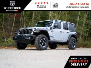 <br> <br>  This Wrangler 4xe isnt just an advanced plug-in hybrid; it is a ticket to wild adventures and all-out fun. <br> <br>No matter where your next adventure takes you, this Jeep Wrangler 4xe is ready for the challenge. With advanced traction and plug-in hybrid technology, sophisticated safety features and ample ground clearance, the Wrangler 4xe is designed to climb up and crawl over the toughest terrain. Inside the cabin of this advanced Wrangler 4xe offers supportive seats and comes loaded with the technology you expect while staying loyal to the style and design youve come to know and love.<br> <br> This silver zynith SUV  has a 8 speed automatic transmission and is powered by a  375HP 2.0L 4 Cylinder Engine.<br> <br> Our Wrangler 4xes trim level is Rubicon. Stepping up to this Wrangler Rubicon rewards you with incredible off-roading capability, thanks to heavy duty suspension, class II towing equipment that includes a hitch and trailer sway control, front active and rear anti-roll bars, upfitter switches, locking front and rear differentials, and skid plates for undercarriage protection. Interior features include an 8-speaker Alpine audio system, voice-activated dual zone climate control, front and rear cupholders, and a 12.3-inch infotainment system with smartphone integration and mobile internet hotspot access. Additional features include cruise control, a leatherette-wrapped steering wheel, proximity keyless entry, and even more. This vehicle has been upgraded with the following features: Heavy Duty Suspension,  Hybrid,  Fast Charging,  Adaptive Cruise Control,  Climate Control,  Wi-fi Hotspot,  Tow Equipment. <br><br> <br/>    Incentives expire 2024-07-02.  See dealer for details. <br> <br>New Vehicle purchases at White Rock Dodge ( DL# 40754) are subject to Fees Totaling $899 Documentation (Government Levies - as per FCA Canada) plus $500 finance placement fee and All Applicable Taxes. <br><br>Our history of continued excellence is backed by putting your interests at the forefront to help you find the vehicle you need. Were conveniently located at 3050 King George Blvd in Surrey. Our team of automotive experts look forward to meeting and serving you! DL# 40754 o~o