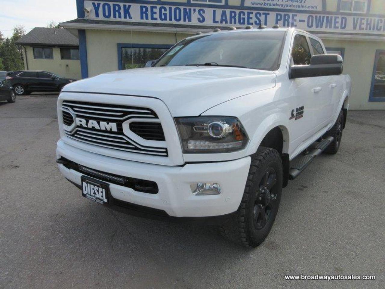 6.7L - V6 - CUMMINS - OHV 24 VALVE TURBO DIESEL ENGINE      <br />4X4 SYSTEM      <br />CREW-CAB     <br />6.6"-FOOT-BOX     <br />RUNNING BOARDS     <br />TRACTION CONTROL    <br />TOW SUPPORT    <br />TRAILER BRAKE     <br />LEATHER INTERIOR     <br />HEATED/AC FRONT SEATS     <br />HEATED STEERING WHEEL     <br />DRIVERS SIDE MEMORY SEAT     <br />ALPINE PREMIUM AUDIO PACKAGE     <br />TOUCH SCREEN DISPLAY       <br />NAVIGATION SYSTEM      <br />AM/FM RADIO PLAYER      <br />AUX INPUT       <br />USB CONNECTION       <br />BLUETOOTH SYSTEM       <br />REVERSE AND FORWARD PARKING AID      <br />BACK-UP CAMERA      <br />REAR HEATED SEATS       <br />POWER FOLDING SIDE MIRRORS     <br />POWER ADJUSTABLE PEDALS       <br />POWER REAR WINDOW       <br />POWER SUNROOF     <br />KEYLESS ENTRY     <br />PUSH-BUTTON-IGNITION    <br />FOG LIGHTS    <br />MULTI-FUNCTIONAL STEERING WHEEL      <br /><br /><br /><br /><br /><br />Family owned and operated since 1975; Broadway Auto Sales is committed to making your next vehicle buying experience as seamless and straight forward as possible. With friendly, no pressure sales staff, as well as a huge selection of vehicles, it's very easy to see why Broadway Auto Sales is the perfect place to find your next ride. <br /><br />Our vehicles are sold and priced as CERTIFIED. Yes. that's right! No hidden mechanical or additional inspection fees are charged to the buyer. The price you see advertised, is the price you pay, plus any applicable HST and license costs. Our vehicles are certified on site, within our own service centre, by licensed, fully trained, and professional mechanics.<br /><br />Get a FREE Carfax Canada Report with the purchase of your new vehicle!<br /><br />Regardless of credit history, we have financing options for every situation. Our specialists work closely with each customer to understand a payment and vehicle that is right for them. We have been working with credit specialists to rebuild credit scores since 1975, and we can achieve approvals other dealers simply can't.<br /><br />Extended warranties on vehicles are also available; at an additional cost. We work with a variety of different warranty companies, and can help you choose based on your driving habits and budget.<br /><br />Have a trade-in? Let us know.. we pay top dollar for trades!<br /><br />Contact us today via e-mail, phone or in-person!<br /><br />WWW.BROADWAYAUTOSALES.COM