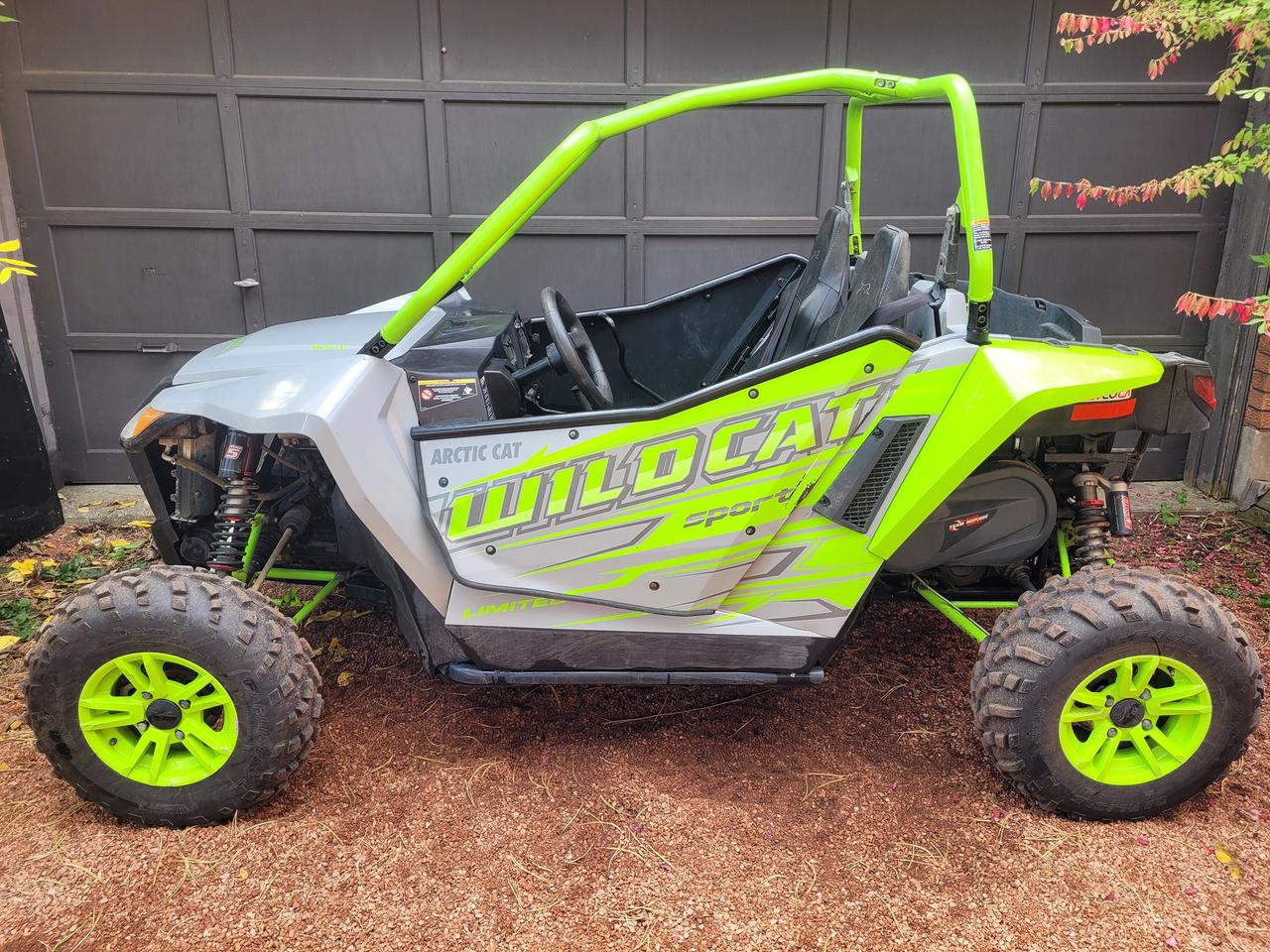 <p>Financing Available & Trade-ins Welcome!</p><p>For 2017, the Arctic Cat Wildcat Sport continues to thrill drivers with a 700cc parallel twin-cylinder four stroke engine with four valves per cylinder, routing power though TEAM Rapid Response clutches. The engine puts out over 60 horsepower. These 60-inch wide Cats are capable trail and dune machines. A closed-loop electronic fuel injection system optimizes fuel efficiency and throttle response.</p><p>A performance -engineered chassis handles a wide-range of terrain types, and gets a lot of help from the outstanding suspension options the Sport lineup has. Up front, a double A-Arm setup guides 12.2-inches of travel. On the rear a dual A-Arm, sway bar-equipped design with 12.6 inches of travel handles the rough stuff with 13 in. of rock-clearing ground clearance.</p><p>The big news is the different shock options. The XT EPS comes with JRi ECX-1 gas shocks with high-volume 2.5-in. aluminum bodies and remote reservoirs with 70-position compression adjustability and spring preload adjustability. The Limited EPS runs Elka Stage 5 gas shocks with 2.5-in. aluminum bodies and remote reservoirs. They have low and high speed compression and rebound adjustability as well as spring preload. The Sport SE runs on high performance</p><p>KING gas shocks delivering compression adjustability and precise rebound damping adjustments.</p><p>The Sport also sports a cargo area with 300lbs. of capacity with additional sealed storage under the hood. Need more, there&rsquo;s a 2-inch receiver hitch and 1,500lbs of towing capacity. The Sports also run on 26-in. Carlisle Trail Pro tires on cast aluminum wheels. The Limited and SE models also get full aluminum half doors. The SE also comes with a 3,000lb Warn winch with synthetic rope in case you get into too much trouble.</p><p>&nbsp;</p>