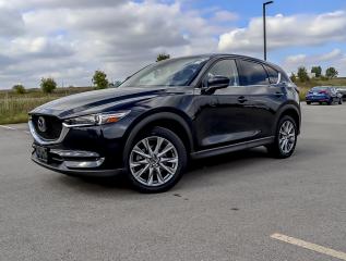 Recent Arrival! Black 2021 Mazda CX-5 Grand Touring AWD 6-Speed Automatic I4 Turbo<br /><br />Alloy wheels, AppLink/Apple CarPlay and Android Auto, Auto High-beam Headlights, Auto-dimming Rear-View mirror, Automatic temperature control, Electronic Stability Control, Exterior Parking Camera Rear, Front Bucket Seats, Front dual zone A/C, Fully automatic headlights, Garage door transmitter: HomeLink, Heated door mirrors, Heated front seats, Heated steering wheel, Heated/Ventilated Front Seats, Leather Upholstery, Memory seat, Navigation System, Power driver seat, Power Liftgate, Power moonroof, Radio: AM/FM/HD w/Bose Premium Sound System, Rain sensing wipers, Speed control, Steering wheel mounted audio controls, Traction control, Turn signal indicator mirrors, Ventilated front seats.<br /><br /><br />Reviews:<br />* The Mazda CX-5 is highly rated for looking and feeling more expensive than it is. Since its introduction, this model has been sought-after by shoppers looking for an up-level crossover driving experience without the up-level price tag. On all elements of styling, handling, and dynamics, owners seem to be impressed. Source: autoTRADER.ca Sale Price is Plus 13% HST, Financing Available OAC (On Approved Credit).