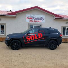 <p><strong><u>****SOLD****</u></strong></p><p> </p><p>Local Vehicle, Accident Free, Very well equipped Grand Cherokee Laredo,  Triple Black, 4X4, </p><p>Customer Preferred Package 23Z</p><p>Black Suede Seats w/Black Stitching</p><p>Altitude Package:</p><p>GPS Antenna, Input Neutral Grey Satin Gloss Tail Lamp, Gloss Black Fascia Applique, Body Color Fascia Black, Headlamp Bezels Body Color Grille w/Platinum Accent Body Color Claddings ,Black Roof Molding, Jeep Black Gloss Badging, Dual Bright Exhaust Tips Steering Wheel Mounted Audio Controls, Body Color Shark Fin Antenna, Sirius/XM Satellite Radio NAV−Capable! ,Security and Convenience Group Cargo Compartment Cover, 115V Auxiliary Power Outlet, Heated Front Seats, Power Liftgate Security ,Alarm Heated Steering Wheel, Uconnect 8.4A AM/FM/BT 8.4 Touchscreen Display, 265/50R20 BSW All Season Tires Goodyear Tires, Remote Start,</p><p>System Trailer Tow Group IV</p><p>180 Amp Alternator ,Heavy Duty Engine Cooling , Rear Load Leveling Suspension, Full Size Spare Tire, Steel Spare, Rear Tow Hook 7 and 4 Pin Wiring Harness, Class IV Receiver Hitch.</p><p> </p><p>Power Sunroof and so much more......</p><p> </p><p>We offer on the spot financing; we finance all levels credit.</p><p>Several Warranty Options Available,</p><p>All our vehicles come with a Manitoba safety.</p><p>Proud members of The Manitoba Used Car Dealer Association as well as the Manitoba Chamber of Commerce.</p><p>All payments, and prices, are plus applicable taxes. Dealers permit #4821</p><p> </p>