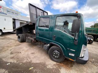 <p>2015 Isuzu NQR Landscape Dump Truck - $55,000</p><br><br><p>Year: 2015</p><br><p>Mileage: 70,699 km</p><br><p>Transmission: Automatic</p><br><p>Engine: 5.2L Diesel</p><br><p>Drivetrain: Rear-Wheel Drive</p><br><p>Color: Green Exterior, Gray Interior</p><br><br><p>Features:</p><br><br><p>12 ft Landscape Box</p><br><p>4 Door Crew Cab</p><br><p>Seats up to 6 Passengers</p><br><p>Air Conditioning</p><br><p>Electric Locks and Windows</p><br><p>Cruise Control</p><br><p>Certified</p><br><p>Excellent Condition</p><br><p>Warranty Available</p><br><p>Financing Available</p><br><br><p>The 2015 Isuzu NQR features a 12 ft landscape box, ideal for companies needing a reliable transport solution for their landscaping operations. Powered by a robust 5.2L diesel engine and designed for performance in various work conditions, this truck offers substantial hauling capabilities. It is certified, maintained in excellent condition, and comes equipped with essential amenities such as air conditioning and cruise control for enhanced driving comfort. Flexible financing options and a warranty are also available, making this a practical and secure investment for your business needs.</p><br><br><p>Contact Information:</p><br><br><p>Name: Abraham</p><br><p>Phone: 416-428-7411</p><br><p>Business Name: A and A Truck Sale</p><br><p>Address: 916 Caledonia Rd, Toronto, ON M6B3Y1</p><br><br><p>For further information or to arrange a demonstration, please contact Abraham at A and A Truck Sale.</p><br><span id=jodit-selection_marker_1714410474300_29066462799619397 data-jodit-selection_marker=start style=line-height: 0; display: none;></span>