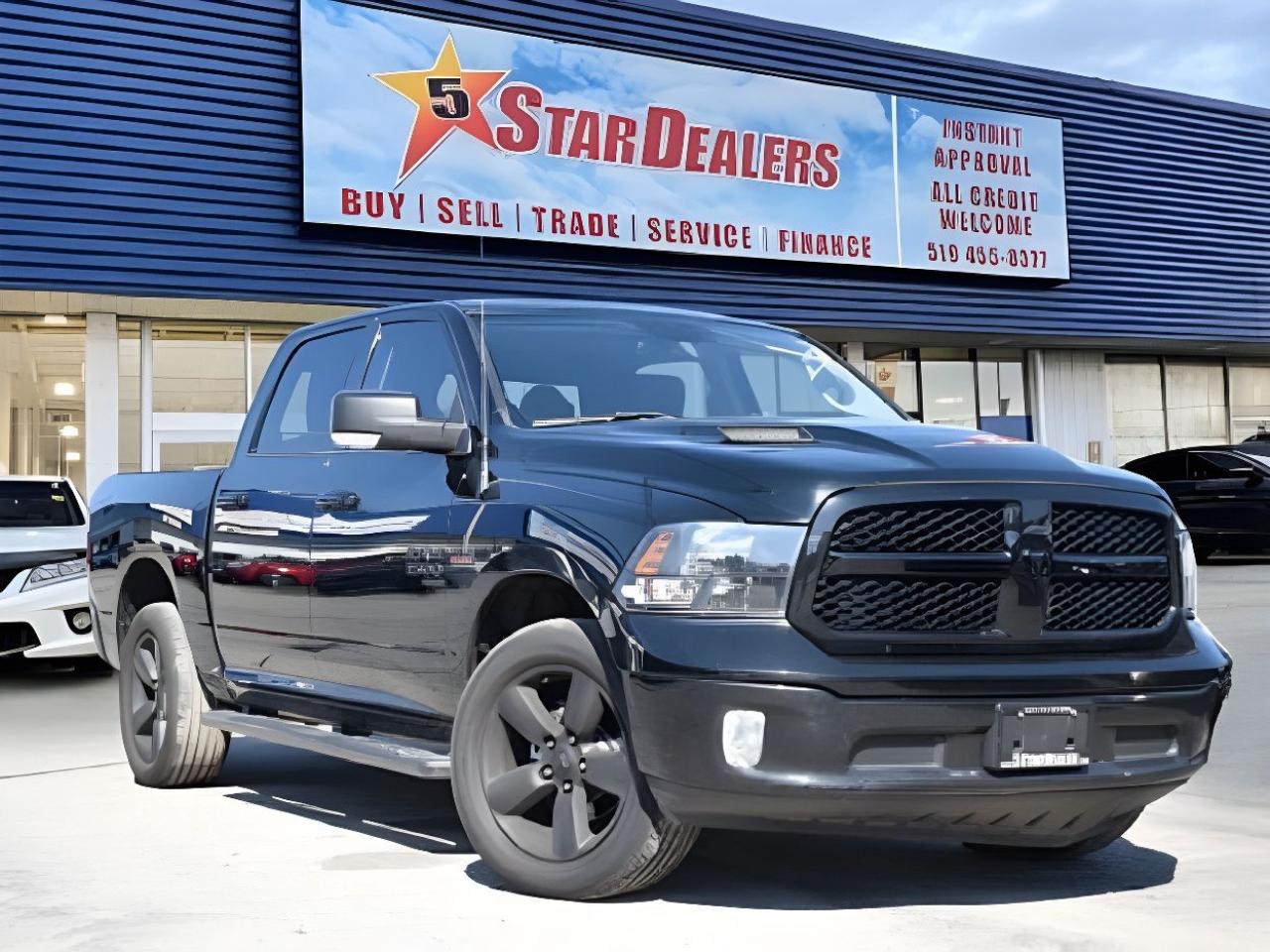 WITH OVER $10,000 FACTORY OPTIONS LIST BELOW SLT 4x4 Crew Cab 57  Box V8 HEMI NAV SUNROOF H-SEATS LOADED! WE FINANCE ALL CREDIT! 500+ VEHICLES IN STOCK
Instant Financing Approvals CALL OR TEXT 519+702+8888! Our Team will secure the Best Interest Rate from over 30 Auto Financing Lenders that can get you APPROVED! We also have access to in-house financing and leasing to help restore your credit.

OVER $10,000 --- 
-----------------------
FACTORY EXTRA OPTIONS 
Premium cloth front bucket seats                         $1,200
Bucket seats                                        
Flat load floor                                
     115–volt auxiliary power outlet              
       Power lumbar adjust                                 
Power 10–way driver seat including 2–way lumbar    
 Customer Preferred Package 27G                    
  Luxury Group                                               $1800
Auto–dimming exterior driver mirror               
  Black, power folding heated mirrors w/ turn signals 7–inch colour in–cluster display                  
 Exterior mirrors with supplemental turn signals   
  Exterior mirrors with courtesy lamps                
Power folding exterior mirrors                    
  LED bed lighting 
Steering wheel–mounted audio controls            
   Leather–wrapped steering wheel                 
     Universal garage door opener                      
  Black Appearance Group                                     $895
Fog lamps                                         
  Black headlamp bezels                             
  Gloss Black grille                               
   20x8–inch Semi–Gloss Black aluminum wheels      
   Semi–Gloss Black wheel centre hub                 
  Heated Seats & Wheel Group                                 $595
Front heated seats                                 
 Heated steering wheel                           
    Remote Start & Security Alarm Group                        $595
Security alarm                                  
    Remote start system                               
  Second–row in–floor storage bins                           $150
8–speed TorqueFlite automatic transmission               $1,000
Anti–spin differential rear axle                           $525
5.7L HEMI VVT V8 engine with FuelSaver MDS                 $900
Rear window defroster                                      $225
Rear power sliding window                                  $300
Power sunroof                                            $1,425
Sport performance hood                                     $995
Uconnect 4C NAV with 8.4–inch display                    $1,720
A/C with dual–zone automatic temperature control  
  GPS navigation                                      
Google Android Auto                               
  8.4–inch touchscreen                                
Apple CarPlay capable                                                     
   SiriusXM Traffic                               
     Humidity sensor                                   
  Class IV hitch receiver                                    $495                               

Financing available for all credit types! Whether you have Great Credit, No Credit, Slow Credit, Bad Credit, Been Bankrupt, On Disability, Or on a Pension,  for your car loan Guaranteed! For Your No Hassle, Same Day Auto Financing Approvals CALL OR TEXT 519-702-8888.
$0 down options available with low monthly payments! At times a down payment may be required for financing. Apply with Confidence at https://www.5stardealer.ca/finance-application/ Looking to just sell your vehicle? WE BUY EVERYTHING EVEN IF YOU DONT BUY OURS: https://www.5stardealer.ca/instant-cash-offer/
The price of the vehicle includes a $480 administration charge. HST and Licensing costs are extra.
*Standard Equipment is the default equipment supplied for the Make and Model of this vehicle but may not represent the final vehicle with additional/altered or fewer equipment options.