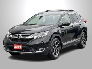 <b>Sunroof,  Navigation,  Leather Seats,  Heated Seats,  Heated Steering Wheel!</b><br> <br>    With car-like handling and excellent fuel efficiency, this capable and comfort 2019 Honda CR-V is the total package. This  2019 Honda CR-V is for sale today in Sudbury. <br> <br>This stylish 2019 Honda CR-V has a spacious interior and car-like handling that captivates anyone who gets behind the wheel. With its smooth lines and sleek exterior, this gorgeous CR-V has no problem turning heads at every corner. Whether youre a thrift-store enthusiast, or a backcountry trail warrior with all of the camping gear, this practical Honda CR-V has got you covered! This  SUV has 60,572 kms. Its  crystal black pearl in colour  . It has an automatic transmission and is powered by a  1.5L I4 16V GDI DOHC Turbo engine.  It may have some remaining factory warranty, please check with dealer for details. <br> <br> Our CR-Vs trim level is Touring AWD. This SUV is made for the long haul with an Infotainment system that includes a 7 inch touchscreen with HondaLink, navigation, HomeLink home remote system, HandsFreeLink bilingual Bluetooth, Apple CarPlay, Android Auto, SiriusXM, a rear view camera, ambient lighting, and a premium 9 speaker sound system. To stay comfortable for the long road ahead, enjoy heated leather seats in front and back, a heated steering wheels, memory settings for the drivers seat, an auto dimming rear view mirror, rain sensing wipers, a hands free power tailgate with programmable height, woodgrain interior, a panoramic moonroof, automatic high and low beam headlights, dual-zone automatic climate control, remote start, heated seats, LED lighting, heated power mirrors, and aluminum wheels. Keeping you safe on a long drive is automatic collision mitigation braking, forward collision warning, lane departure warning, road departure mitigation, and lane keep assist, and a blind spot display and information system. This vehicle has been upgraded with the following features: Sunroof,  Navigation,  Leather Seats,  Heated Seats,  Heated Steering Wheel,  Blind Spot Display,  Automatic Braking. <br> <br>To apply right now for financing use this link : <a href=https://www.palladinohonda.com/finance/finance-application target=_blank>https://www.palladinohonda.com/finance/finance-application</a><br><br> <br/><br>Palladino Honda is your ultimate resource for all things Honda, especially for drivers in and around Sturgeon Falls, Elliot Lake, Espanola, Alban, and Little Current. Our dealership boasts a vast selection of high-class, top-quality Honda models, as well as expert financing advice and impeccable automotive service. These factors arent what set us apart from other dealerships, though. Rather, our uncompromising customer service and professionalism make every experience unforgettable, and keeps drivers coming back. The advertised price is for financing purchases only. All cash purchases will be subject to an additional surcharge of $2,501.00. This advertised price also does not include taxes and licensing fees.<br> Come by and check out our fleet of 150+ used cars and trucks and 80+ new cars and trucks for sale in Sudbury.  o~o