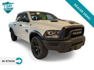 <p>We are thrilled to showcase the rugged and stylish 2023 RAM 1500 Classic Warlock Crew Cab 4X4. This truck embodies the spirit of adventure with its powerful performance, advanced features, and distinctive design.</p>

<p><strong>Performance</strong></p>

<p>Powered by a responsive 3.6L Pentastar VVT V6 engine paired with an 8-speed automatic transmission, the RAM 1500 Classic Warlock delivers impressive performance and efficiency. Whether you're navigating city streets or exploring off-road trails, this truck offers smooth acceleration and dynamic handling.</p>

<p><strong>Exterior</strong></p>

<p>Dressed in a bold Bright White finish and enhanced with the Warlock Package, this truck exudes confidence and presence on the road. Featuring black exterior badging, a black grille with Ram lettering, and 20x9-inch High Gloss Black aluminum wheels, the RAM 1500 Classic Warlock commands attention wherever it goes.</p>

<p><strong>Interior</strong></p>

<p>Step inside the RAM 1500 Classic Warlock and discover a spacious and comfortable cabin designed for both work and leisure. With a cloth front 40/20/40 split bench seat, dual-zone automatic temperature control, and an 8.4-inch touchscreen with Google Android Auto and Apple CarPlay capability, this truck offers convenience and connectivity at your fingertips.</p>

<p><strong>Safety and Technology</strong></p>

<p>Equipped with advanced safety features like ParkView Rear Back-Up Camera and Park-Sense Rear Park Assist System, the RAM 1500 Classic Warlock prioritizes your safety and peace of mind on every journey. Plus, with innovative technology features such as SiriusXM satellite radio, hands-free phone communication, and Uconnect 5 with an 8.4-inch display, this truck keeps you connected and entertained on the go.</p>

<p><strong>T</strong>he 2023 RAM 1500 Classic Warlock Crew Cab 4X4 is a versatile and capable truck that combines rugged performance with advanced features and bold styling. With its powerful engine, innovative technology, and distinctive design elements, this truck is perfect for drivers who demand both functionality and style.</p>
<p> </p>

<p><em>Note: This is a used demo vehicle. The price may include added aftermarket accessories. Please contact dealer for details and current mileage.</em></p>

<h4>BUY WITH COMPLETE CONFIDENCE</h4>

<p>AutoIQ Exclusive Pre-Owned Program<br />
Shop online or in-store, any way you want it<br />
Virtual trade estimate & appraisal<br />
Virtual credit approval & eSignature<br />
7-Day Money Back Guarantee*</p>

<p>The AutoIQ Dealership Group came together in 2016 with a mission to deliver an exceptional car-buying experience. With 16 dealerships across Ontario, offering 14 brands and over 2500 vehicles in stock, AutoIQ customers can expect great selection, value, and trust. Buying a new vehicle is a significant purchase, and we want to ensure that you LOVE it! Whether you are purchasing a new or quality pre-owned vehicle from us, we offer attractive financing rates and flexible terms, regardless of your credit.</p>

<p>SPECIAL NOTE: This vehicle is reserved for AutoIQs retail customers only. Please, no dealer calls. Errors and omissions excepted.</p>

<p>*As-traded, specialty or high-performance vehicles are excluded from the 7-Day Money Back Guarantee Program (including, but not limited to Ford Shelby, Ford mustang GT, Ford Raptor, Chevrolet Corvette, Camaro 2SS, Camaro ZL1, V-Series Cadillac, Dodge/Jeep SRT, Hyundai N Line, all electric models)</p>

<p>INSGMT</p>