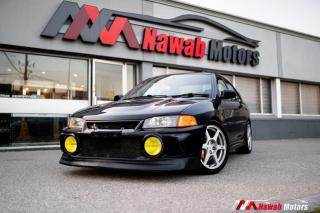 <p><strong>The Lancer Evolution IV was a true milestone in the rally-race inspired cars from Mitsubishi. It was launched in 1996 and it was the first to introduce the Active Yaw Control, which made the car faster on the bends.</strong></p>
<p><strong>FEATURES -</strong></p>
<p><strong>- RIGHT HAND DRIVE</strong></p>
<p><strong>- Momo mitsubhishi steering wheel</strong></p>
<p><strong>- Recaro seats</strong></p>
<p><strong>- Enkei wheels</strong></p>
<p><strong>- Upgraded Brembo brakes</strong></p>
<p><strong>- AEM air/fuel ratio gauge</strong></p>
<p><strong>- Boost gauge</strong></p>
<p><strong>- Mishimoto radiator</strong></p>
<p><strong>- Air intake</strong></p>
<p><strong>- Spoiler</strong></p>
<p><strong>- Upgraded touch media screen with bluetooth</strong></p>
<p><strong>MUCH MORE!!</strong></p>
<p> </p>
<p> </p><br><p>OPEN 7 DAYS A WEEK. FOR MORE DETAILS PLEASE CONTACT OUR SALES DEPARTMENT</p>
<p>905-874-9494 / 1 833-503-0010 AND BOOK AN APPOINTMENT FOR VIEWING AND TEST DRIVE!!!</p>
<p>BUY WITH CONFIDENCE. ALL VEHICLES COME WITH HISTORY REPORTS. WARRANTIES AVAILABLE. TRADES WELCOME!!!</p>