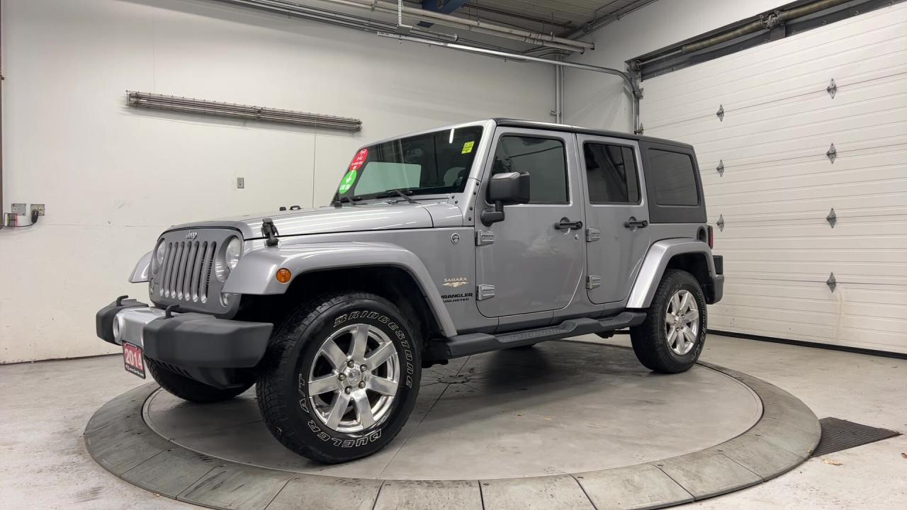 2014 Jeep Wrangler Unlimited SAHARA 4DR | DUAL TOP | LOW KMS! | NAV | RMT START Photo