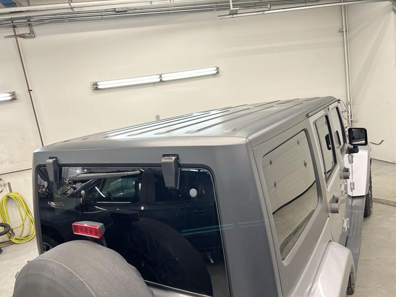 2014 Jeep Wrangler Unlimited SAHARA 4DR | DUAL TOP | LOW KMS! | NAV | RMT START Photo