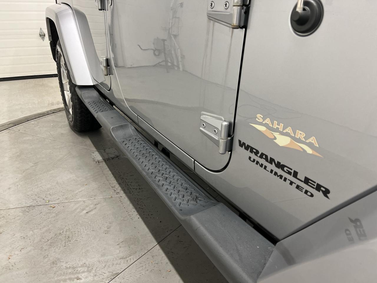 2014 Jeep Wrangler Unlimited SAHARA 4DR | DUAL TOP | LOW KMS! | NAV | RMT START Photo