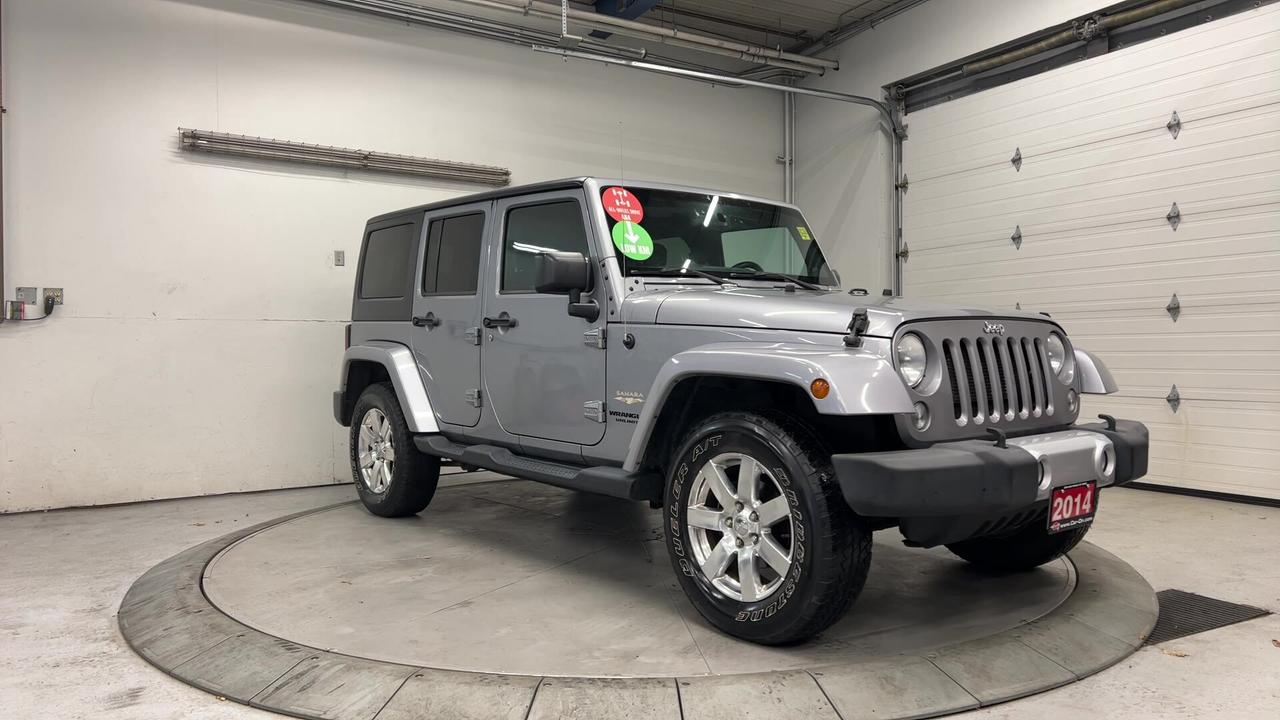 2014 Jeep Wrangler Unlimited SAHARA 4DR | DUAL TOP | LOW KMS! | NAV | RMT START Photo