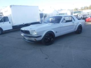 1966 Ford Mustang 2 Door Coupe Wide Body, 8 cylinder Cobra Kit, power steering, power brakes, 4 wheel disc brakes, back up camera , navigation, Blue Tooth lots of money invested, white exterior, black interior.(Kilometres are unverified ) $38,460.00 plus $375 processing fee, $38,835.00 total payment obligation before taxes.  Listing report, warranty, contract commitment cancellation fee, financing available on approved credit (some limitations and exceptions may apply). All above specifications and information is considered to be accurate but is not guaranteed and no opinion or advice is given as to whether this item should be purchased. We do not allow test drives due to theft, fraud and acts of vandalism. Instead we provide the following benefits: Complimentary Warranty (with options to extend), Limited Money Back Satisfaction Guarantee on Fully Completed Contracts, Contract Commitment Cancellation, and an Open-Ended Sell-Back Option. Ask seller for details or call 604-522-REPO(7376) to confirm listing availability.