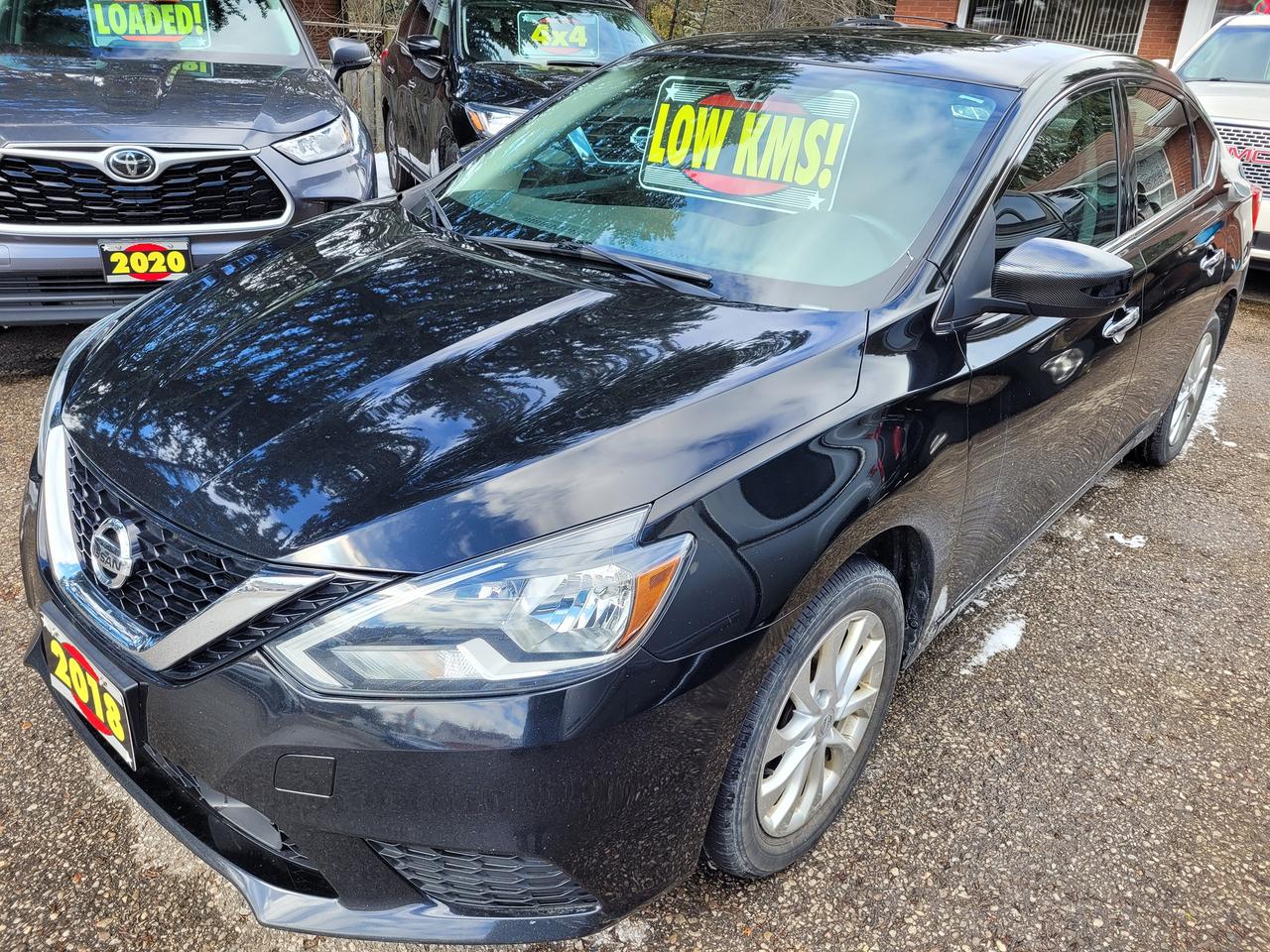 <p>Accident Free, Certified, Financing Available & Trade-ins Welcome!</p><p>Looking for a reliable and stylish sedan thats perfect for commuting and weekend adventures? Look no further than this sleek 2018 Nissan Sentra SV! This certified pre-owned vehicle, with only 117,000km on the odometer, comes with a clean CarFax and is ready to hit the road.</p><p>Step inside and enjoy the comfort of heated front seats, while staying connected with the Bluetooth system and navigation system. The Sentra SV offers a smooth ride thanks to its CVT transmission, making it effortless to navigate city traffic and highways. Stay safe and confident with features like a backup camera, anti-lock brakes, and a comprehensive suite of airbags.</p><p>This Nissan Sentra SV is sure to impress, offering a perfect blend of style, efficiency, and practicality. Visit Rockwood Motor Products today and experience the comfort and reliability this Sentra has to offer.</p><p><strong>Here are 5 sizzle features:</strong></p><ul><li><strong>Clean CarFax Certified:</strong> Enjoy peace of mind with a trusted history.</li><li><strong>Heated Front Seats:</strong> Stay warm and cozy during those chilly Canadian mornings.</li><li><strong>Navigation System:</strong> Get where you need to go with ease.</li><li><strong>Backup Camera:</strong> Park with confidence and avoid costly mishaps.</li><li><strong>CVT Transmission:</strong> Experience a smooth and fuel-efficient ride.</li></ul><p><em>Powered by AutoIntelligence&trade; AI</em></p>